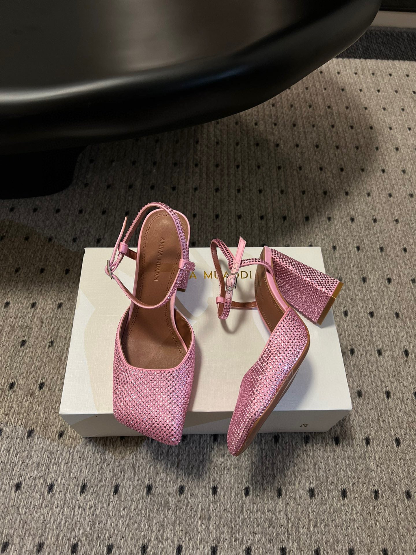 AMINA M HEELS