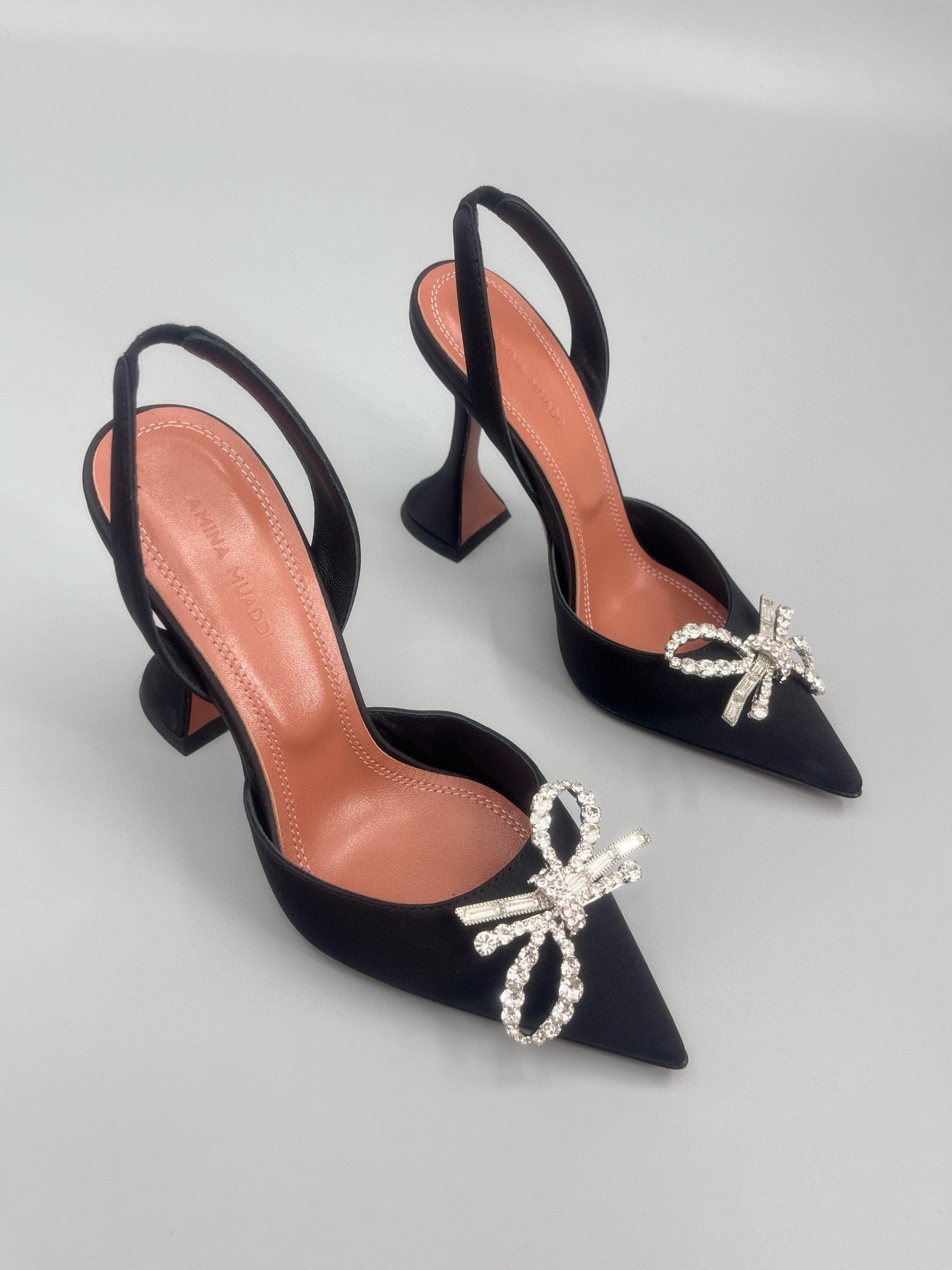 AMINA M HEELS