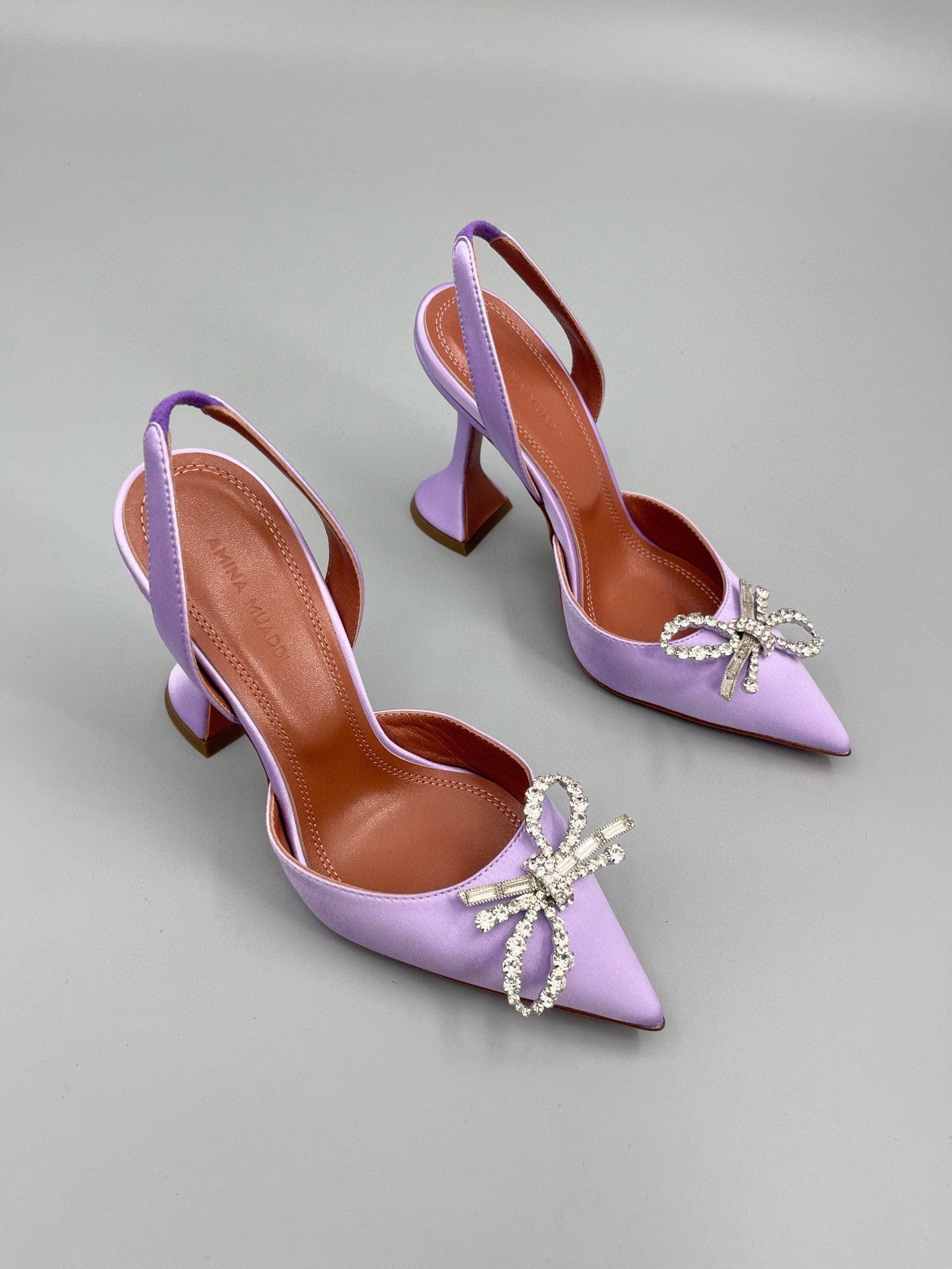 AMINA M HEELS