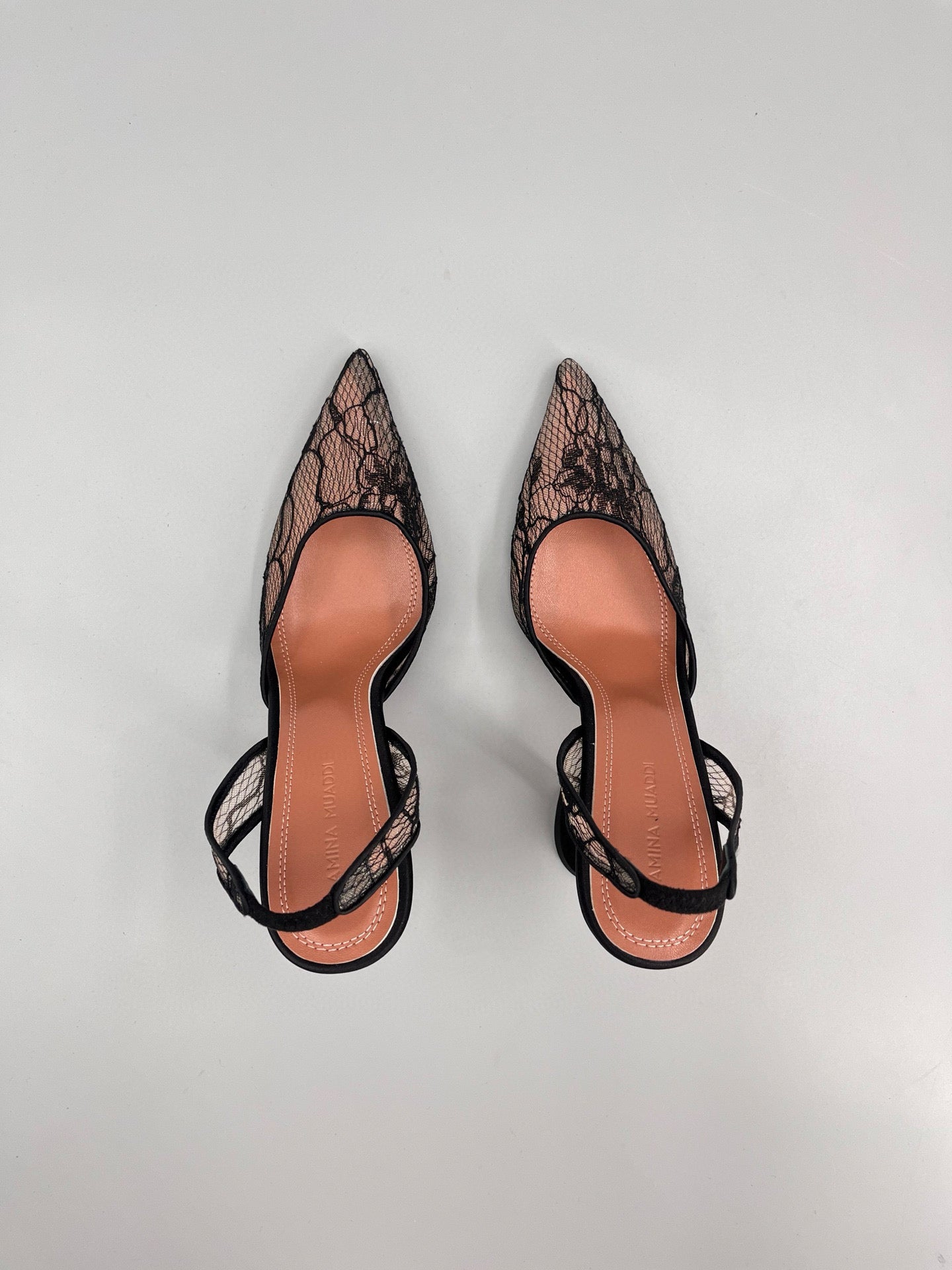 AMINA M HEELS