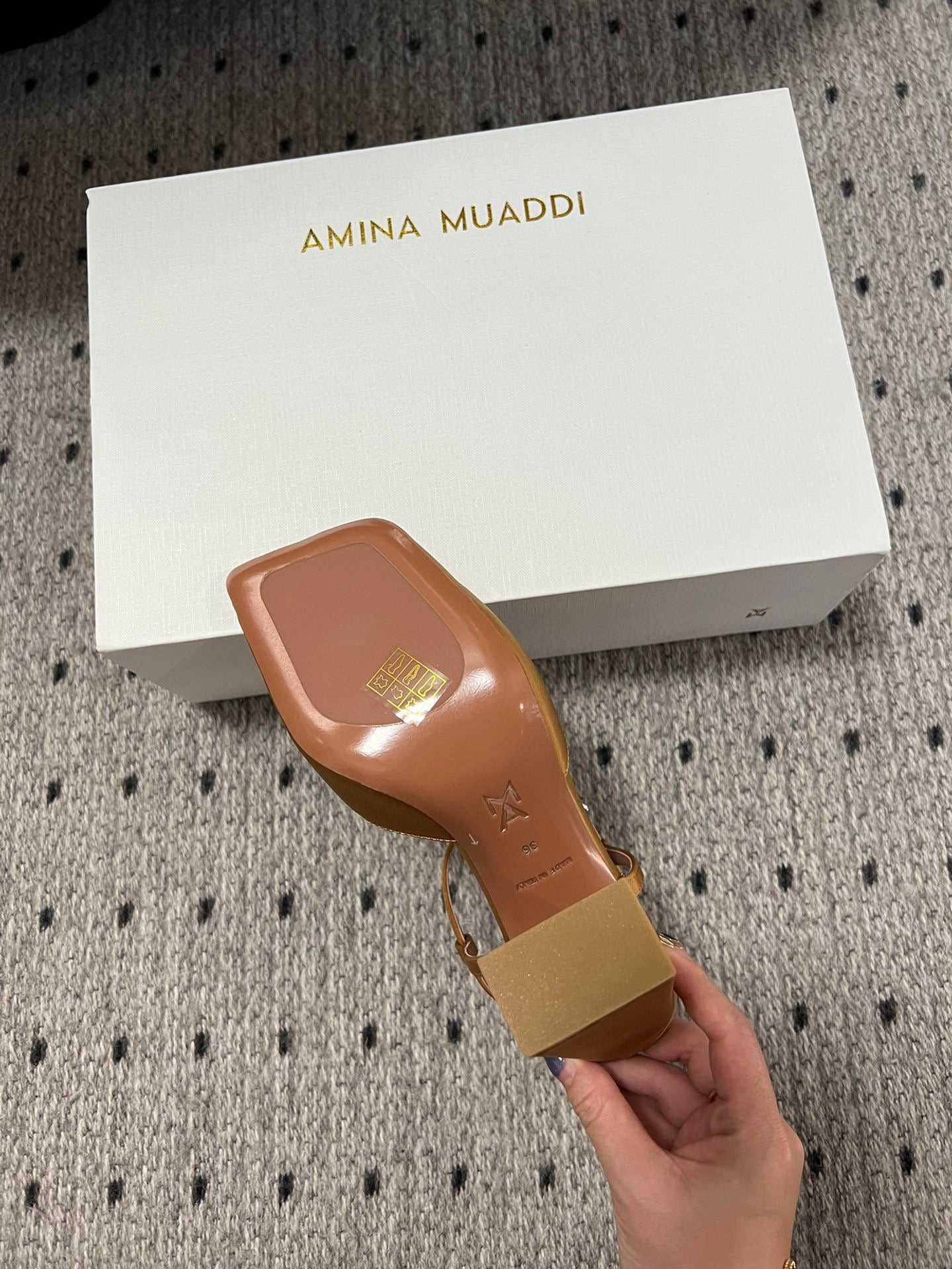 AMINA M HEELS
