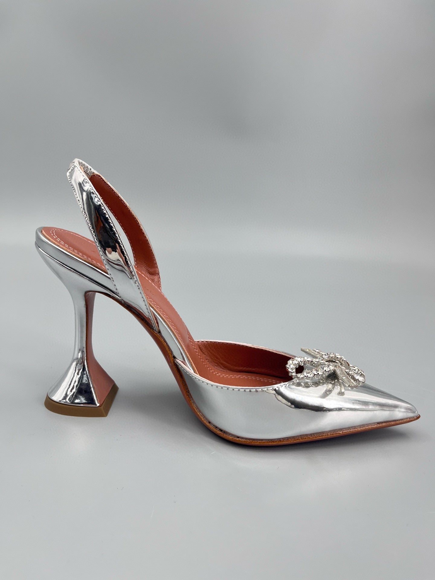 AMINA M HEELS