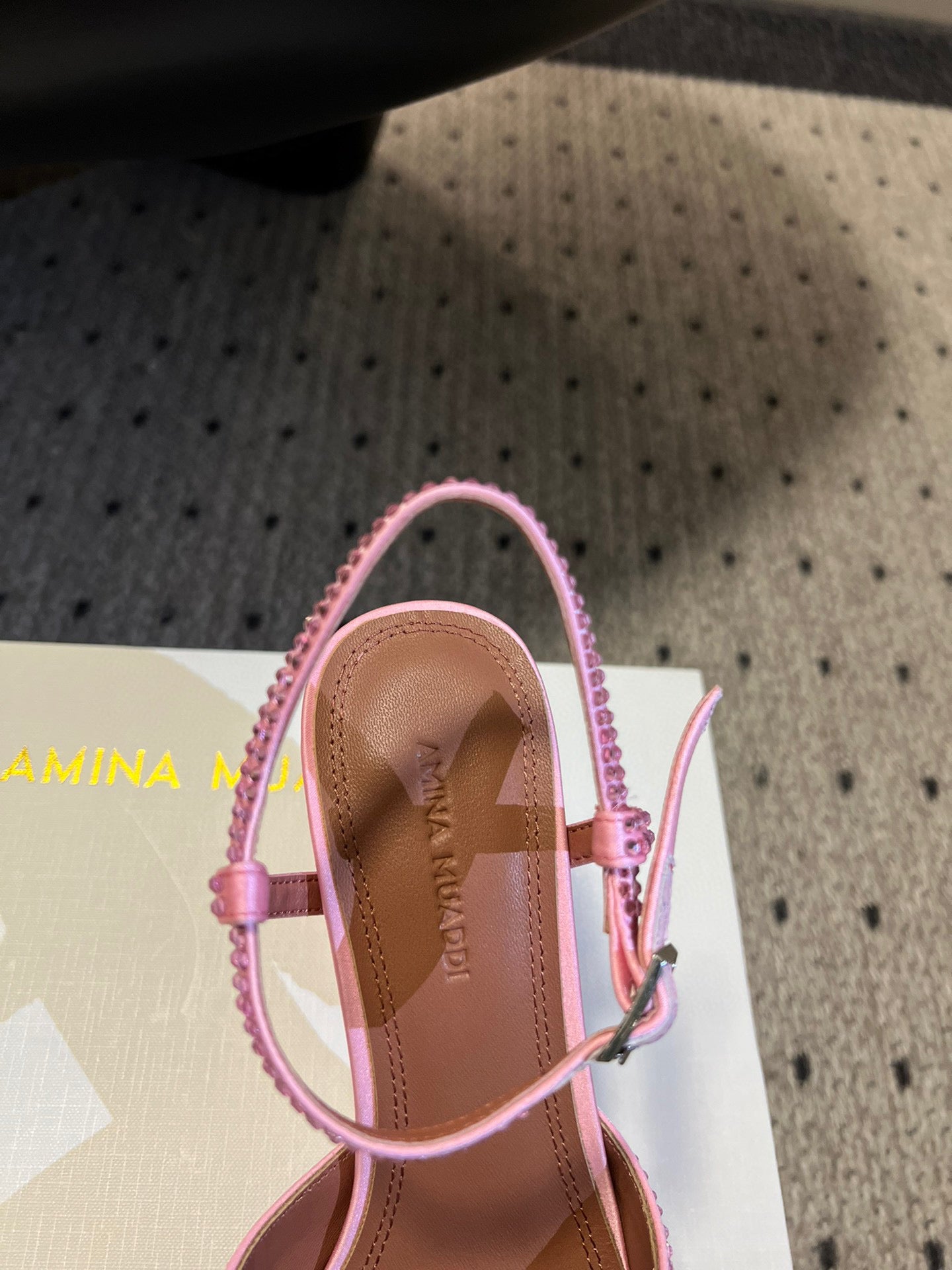 AMINA M HEELS