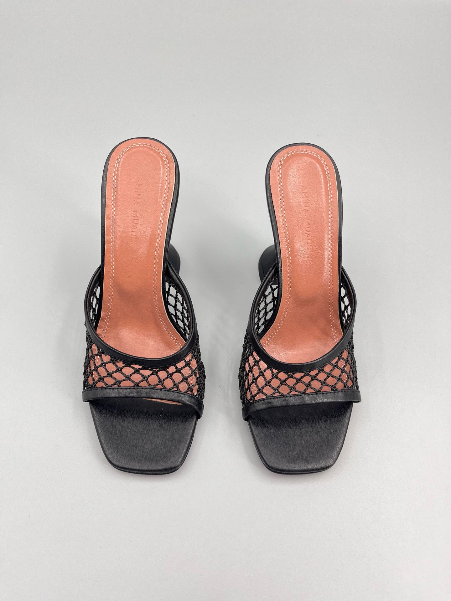 AMINA M HEELS