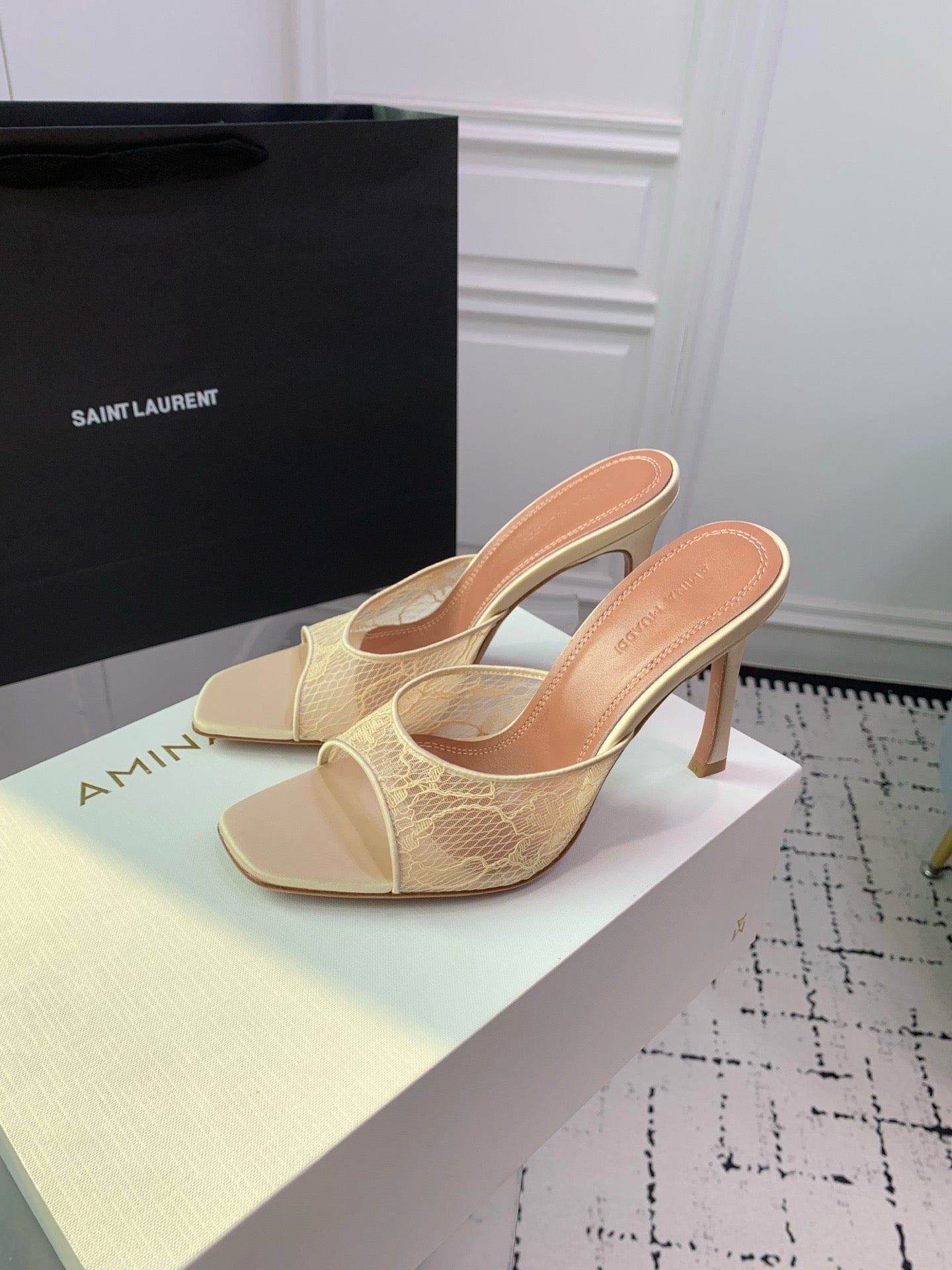 AMINA M HEELS