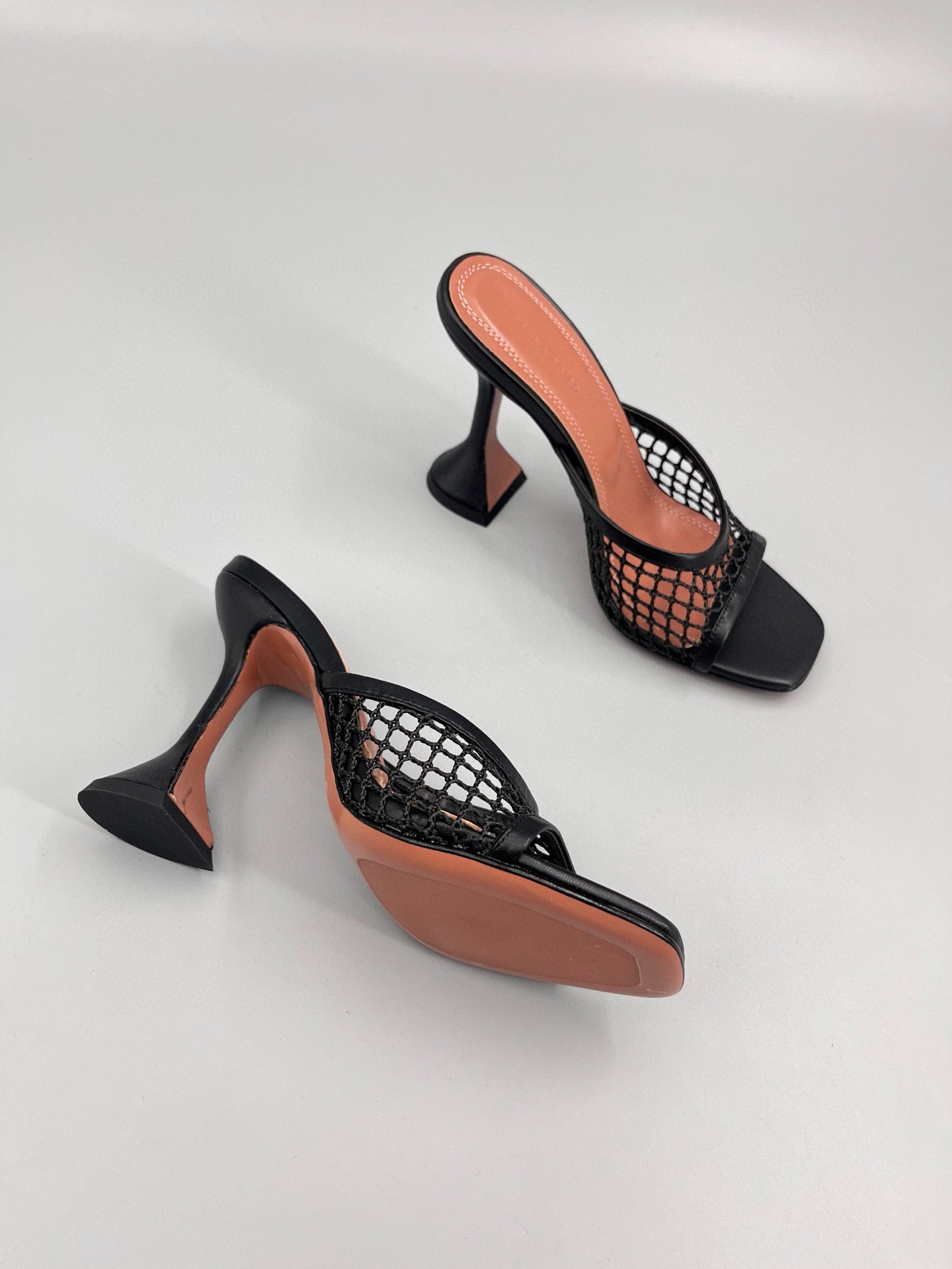 AMINA M HEELS