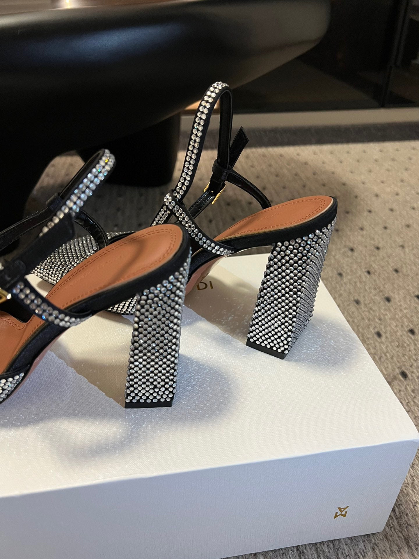 AMINA M HEELS