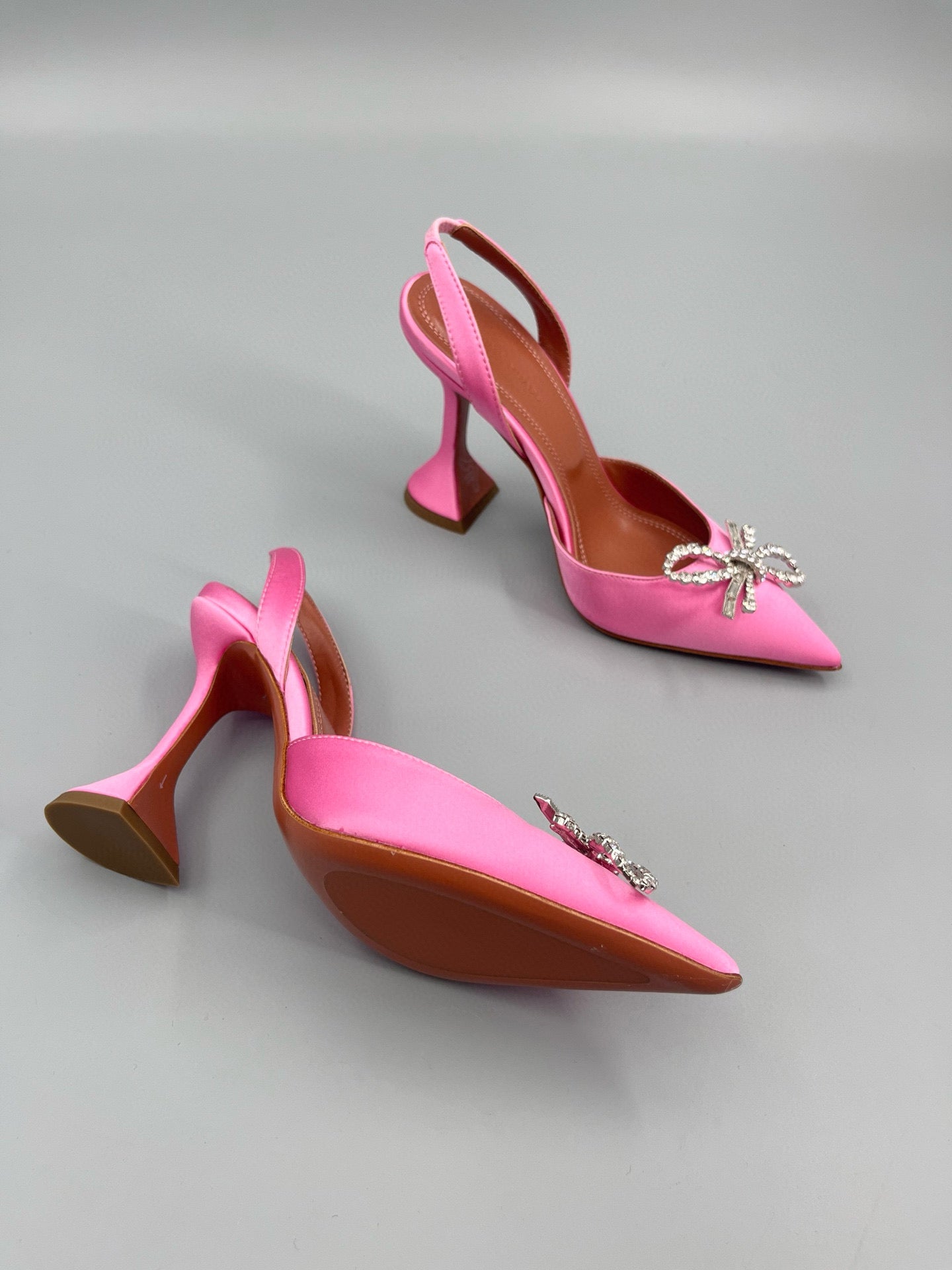 AMINA M HEELS