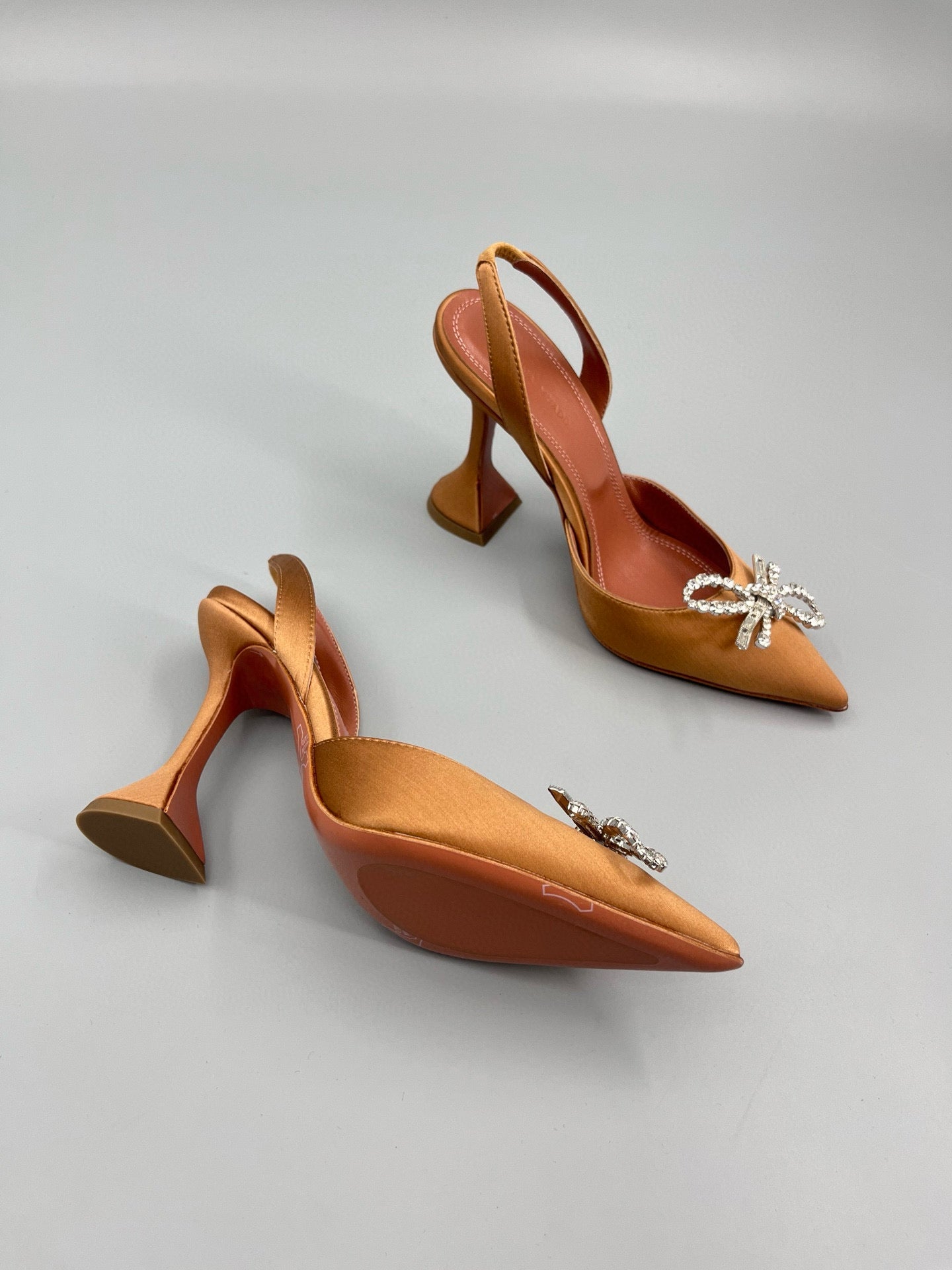 AMINA M HEELS