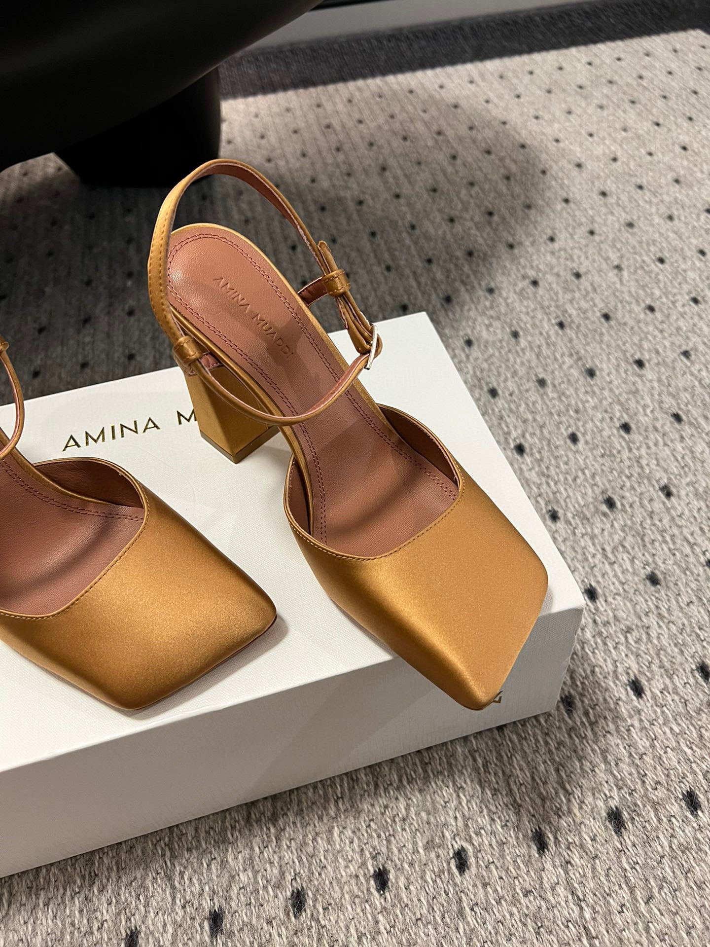 AMINA M HEELS