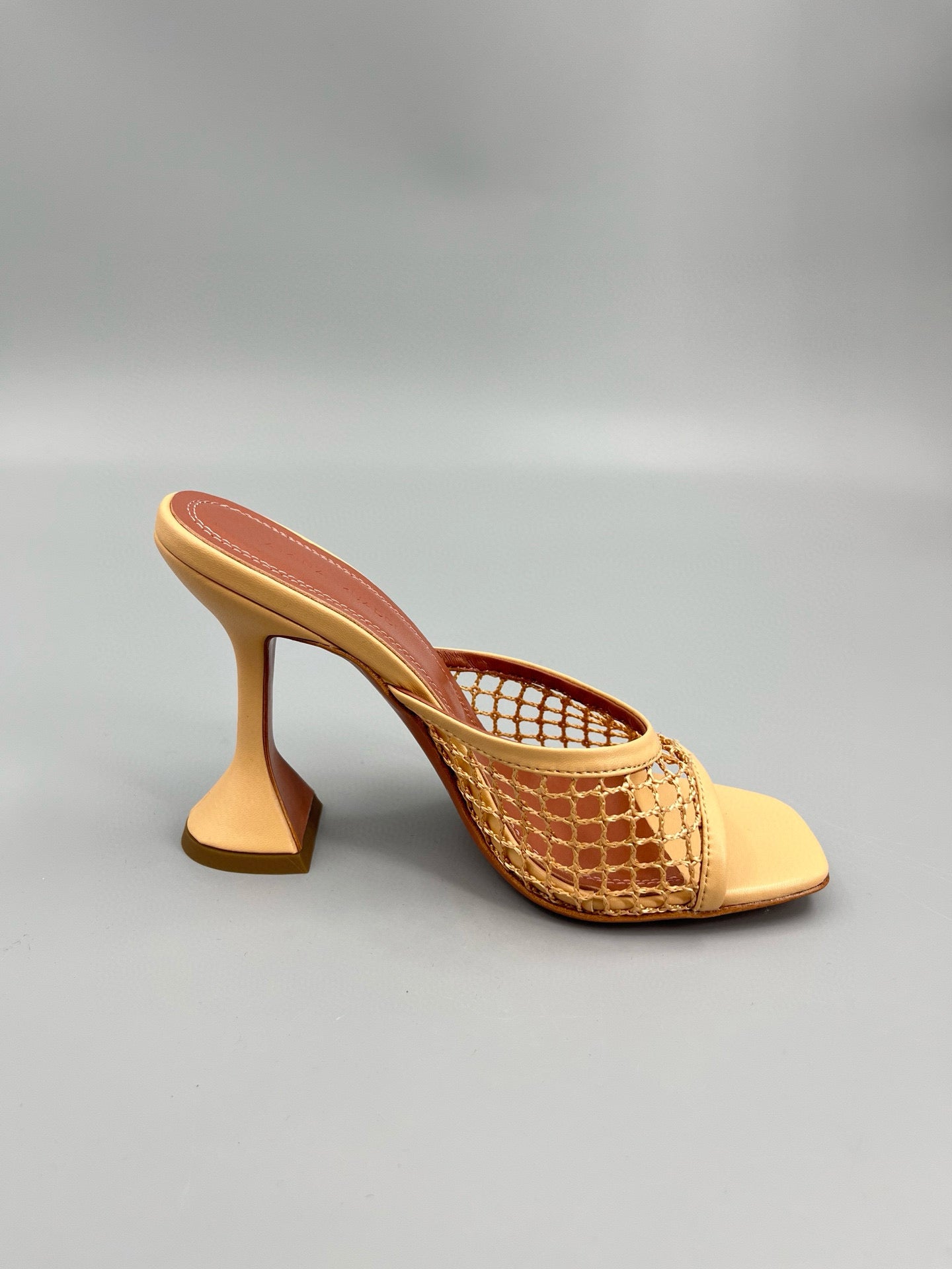 AMINA M HEELS