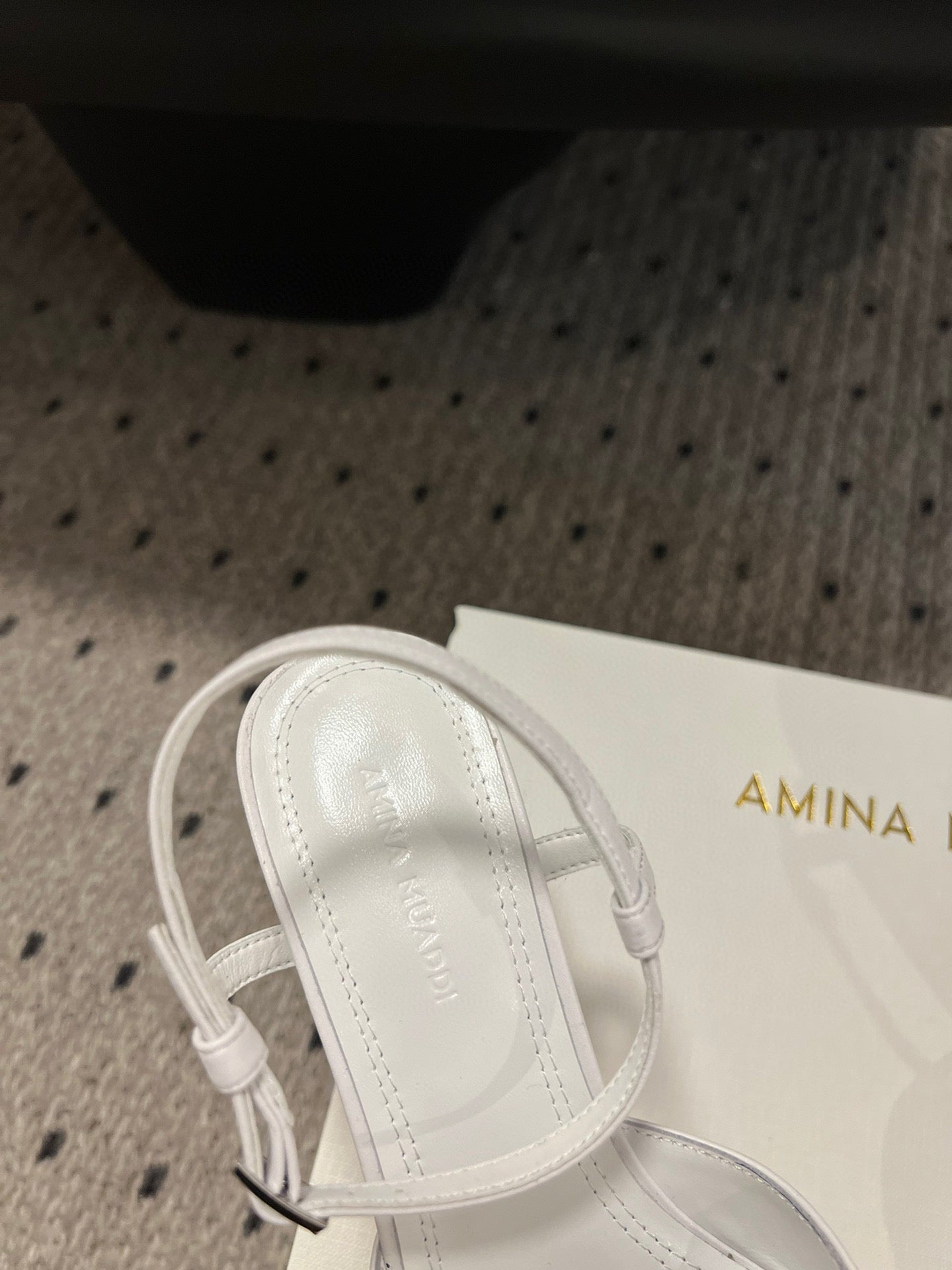 AMINA M HEELS