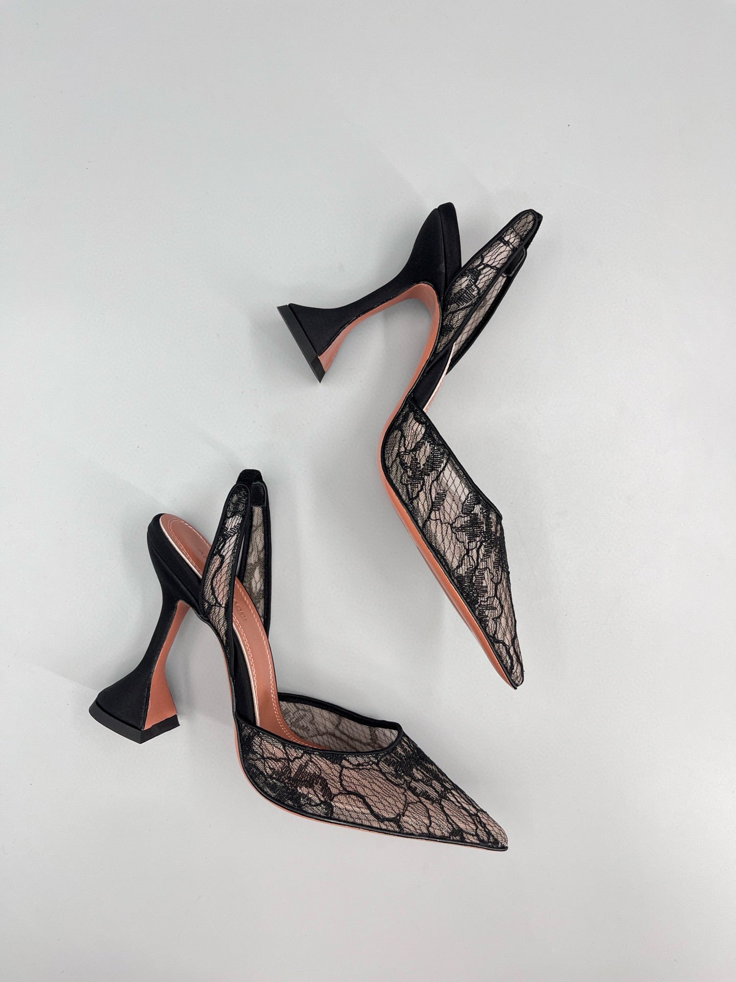 AMINA M HEELS