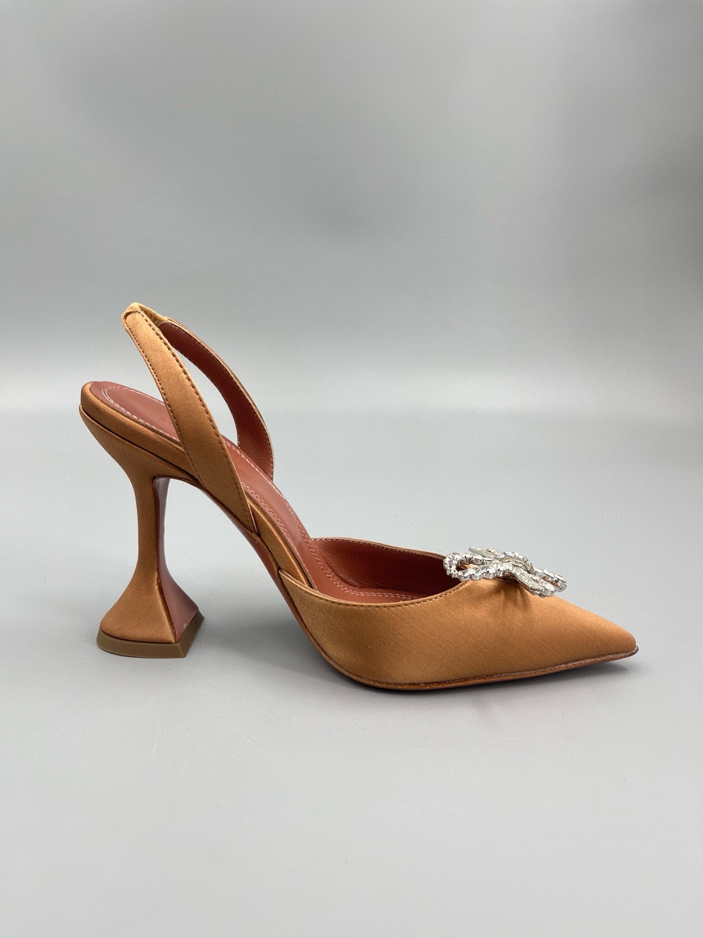 AMINA M HEELS