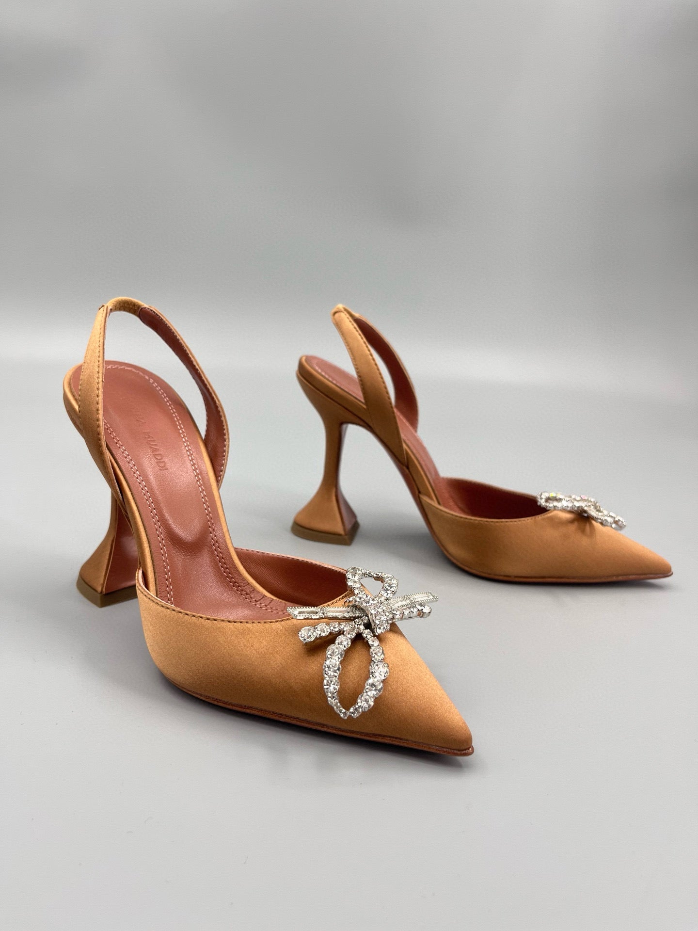 AMINA M HEELS