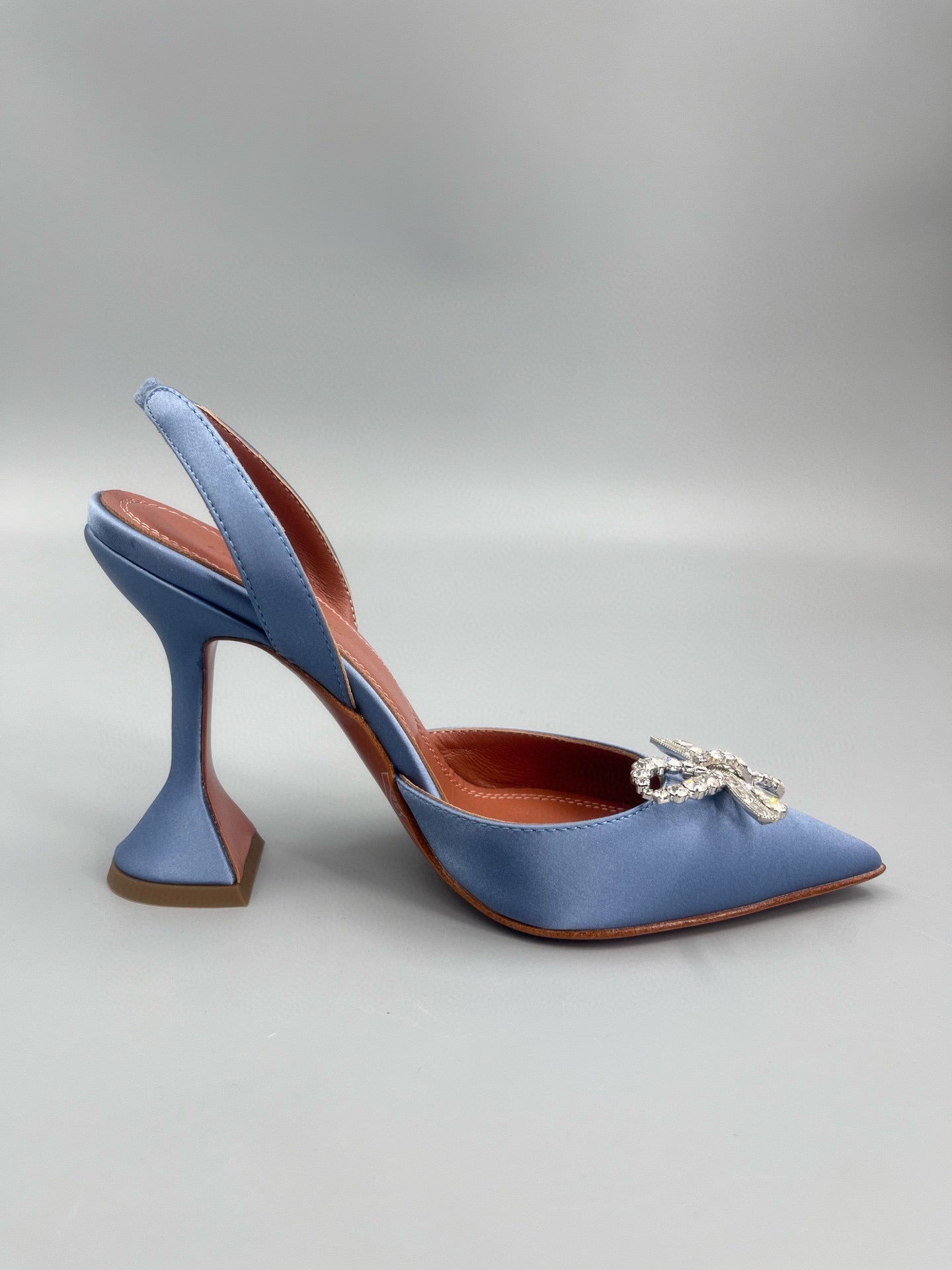 AMINA M HEELS