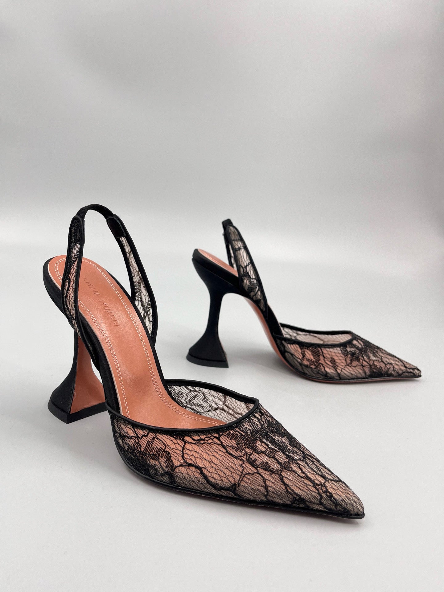 AMINA M HEELS