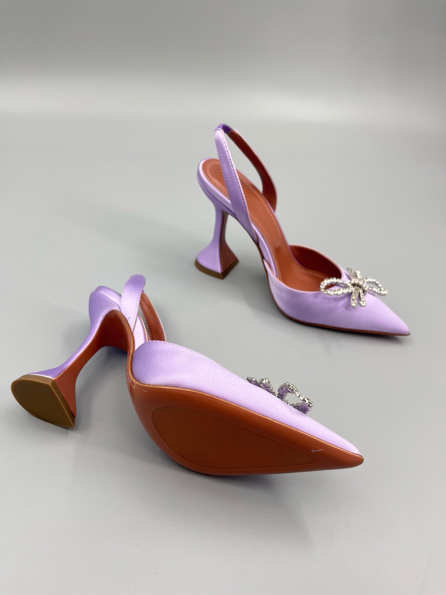 AMINA M HEELS
