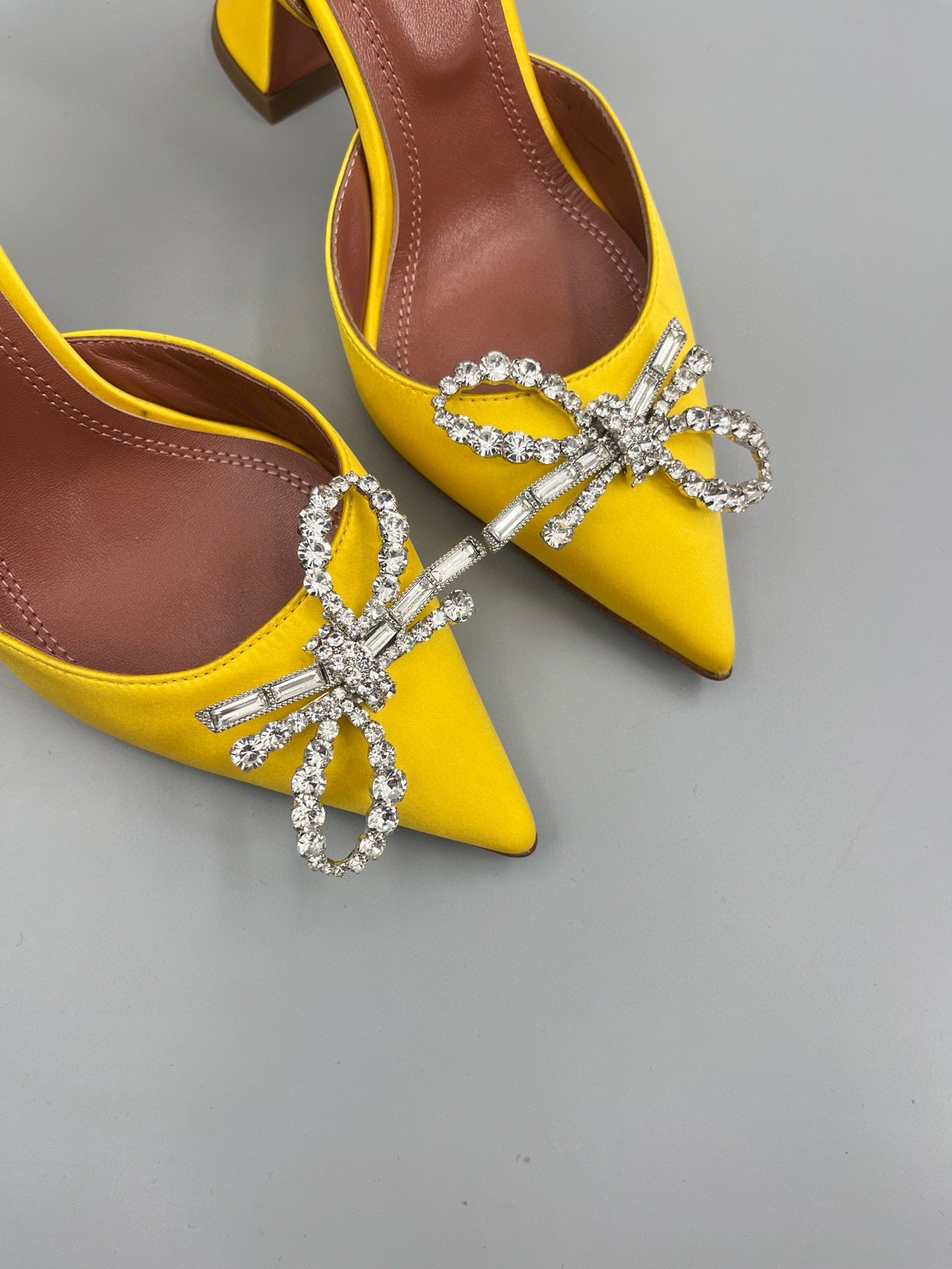 AMINA M HEELS