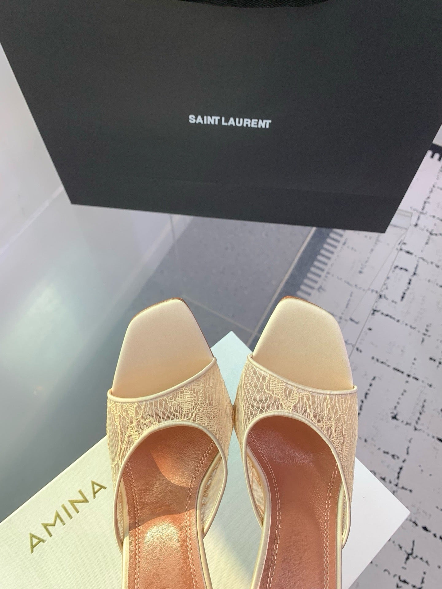 AMINA M HEELS