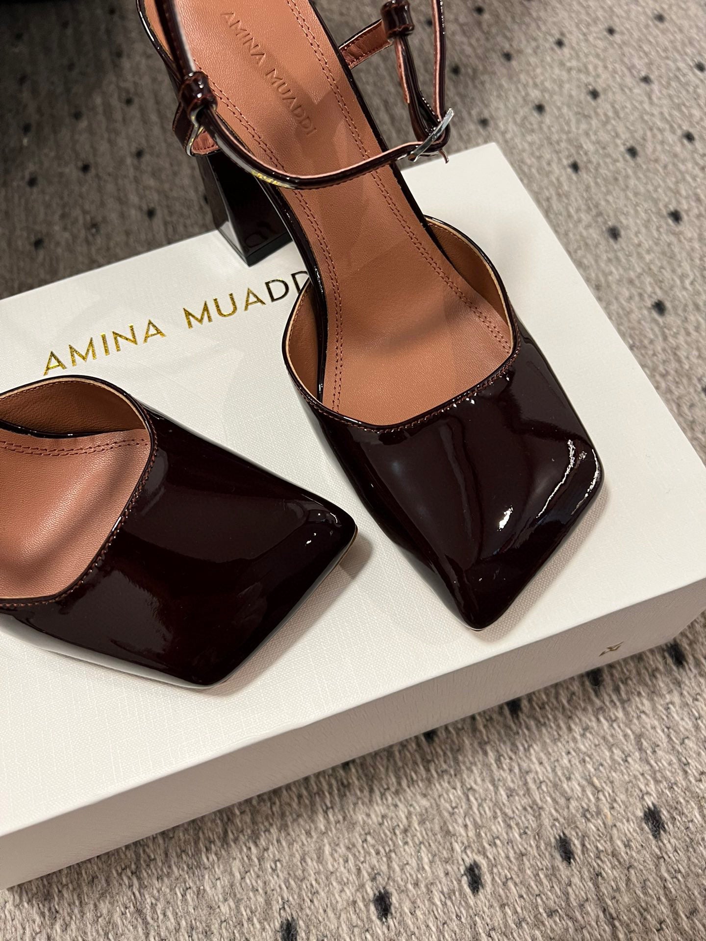 AMINA M HEELS