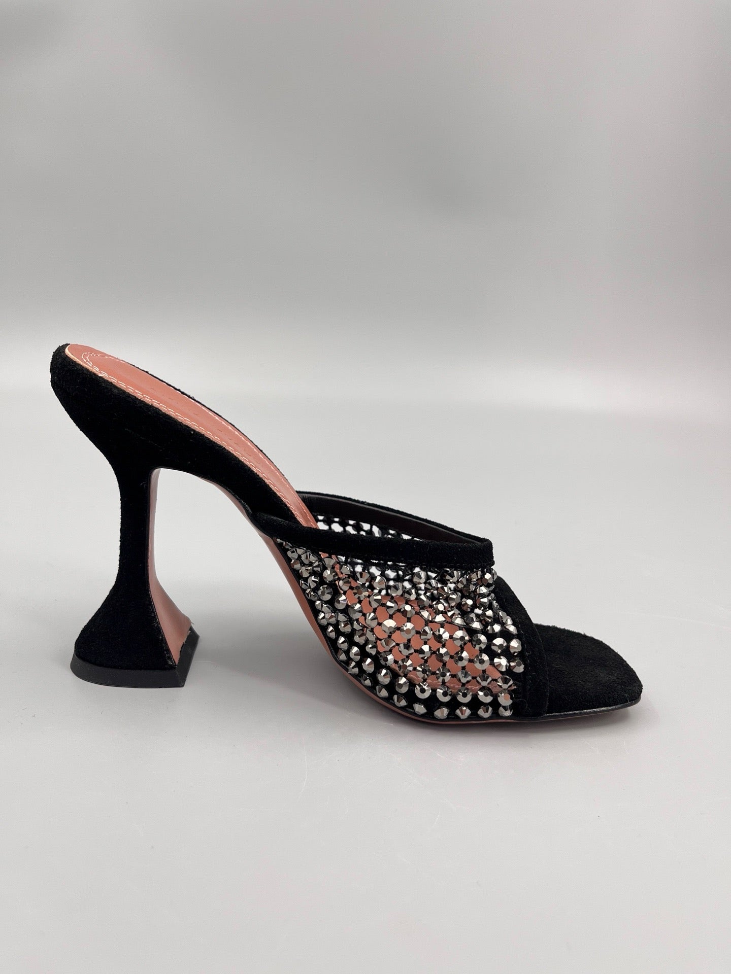 AMINA M HEELS