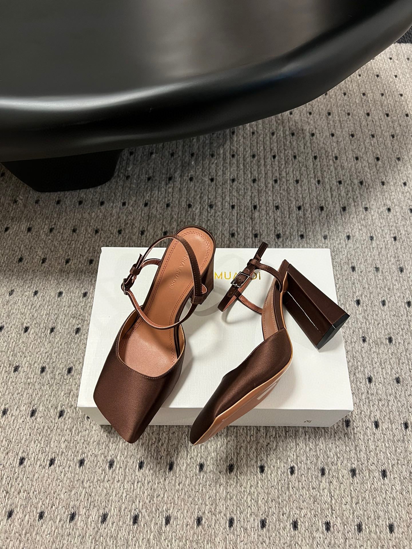 AMINA M HEELS