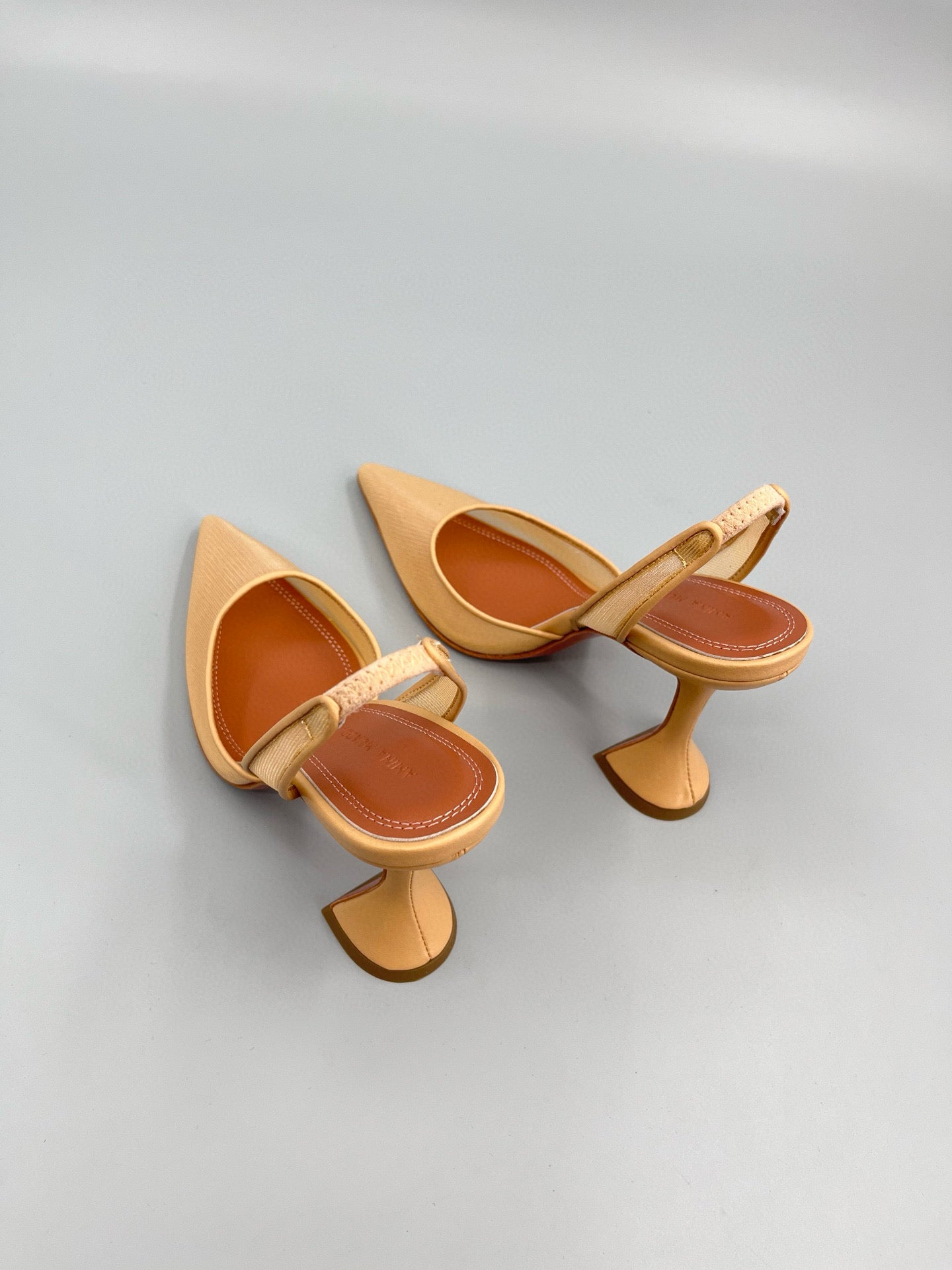 AMINA M HEELS