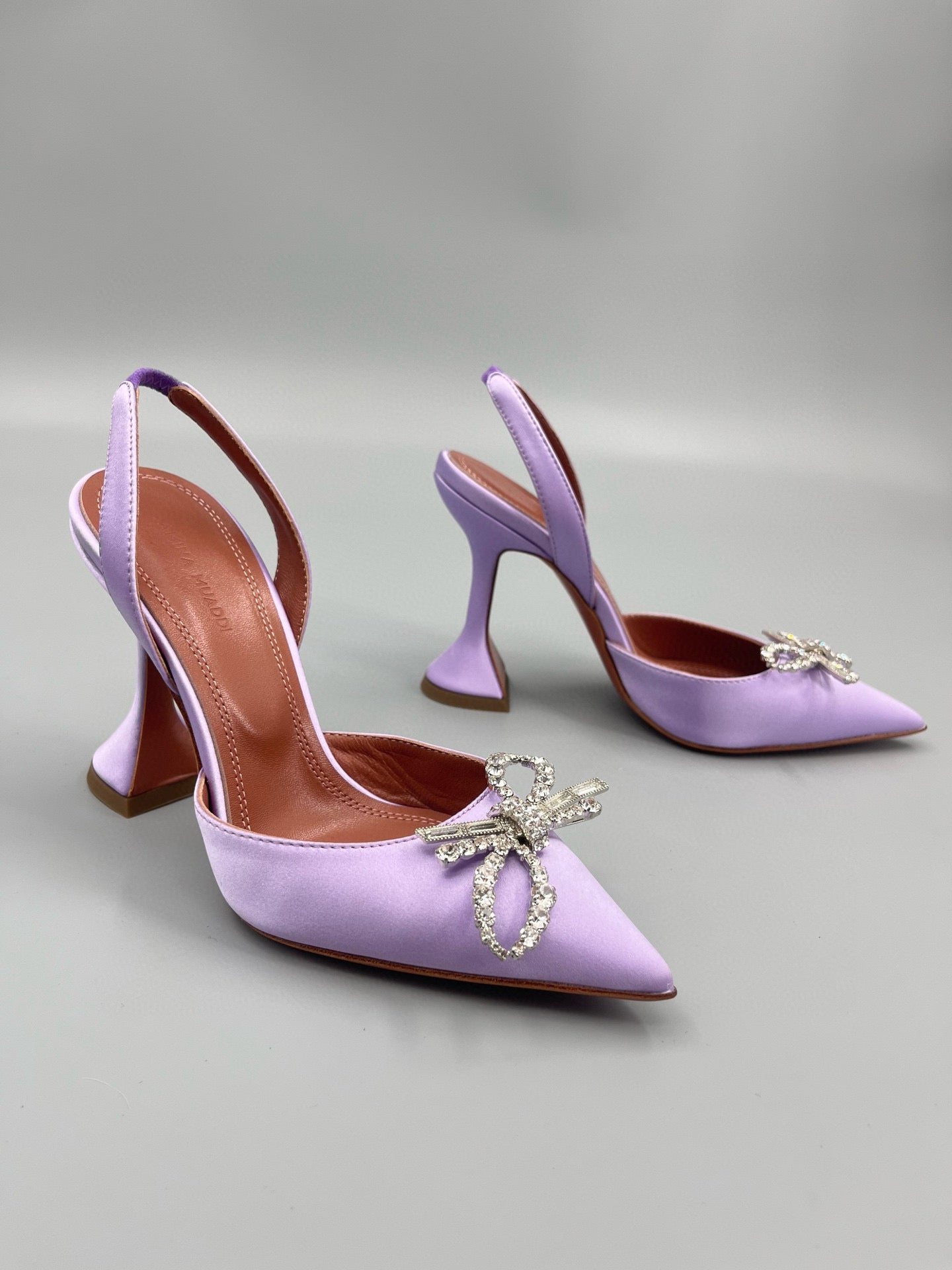 AMINA M HEELS