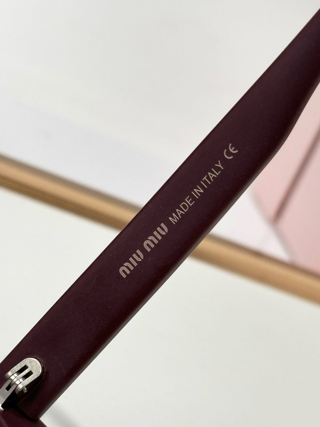 MIU M SUNGLASSES