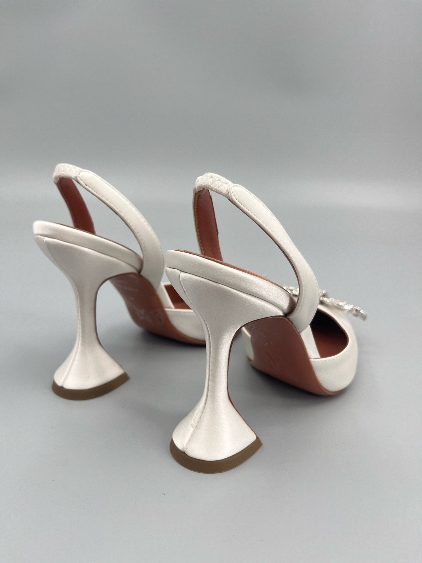 AMINA M HEELS
