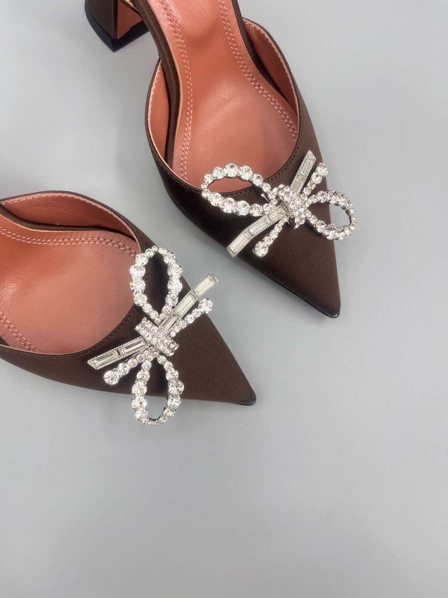AMINA M HEELS