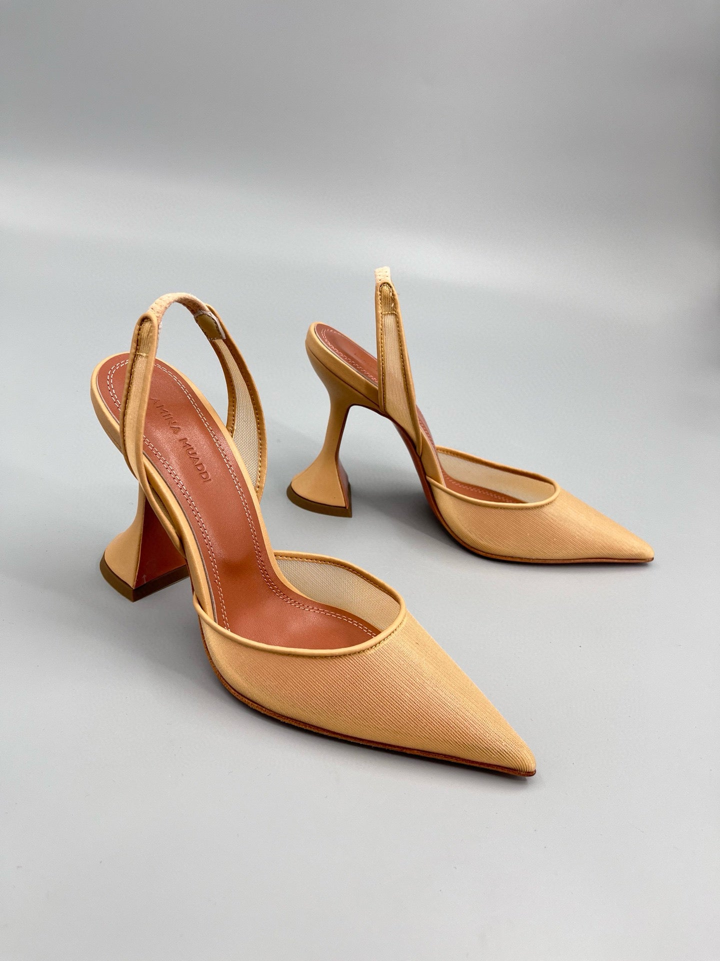 AMINA M HEELS
