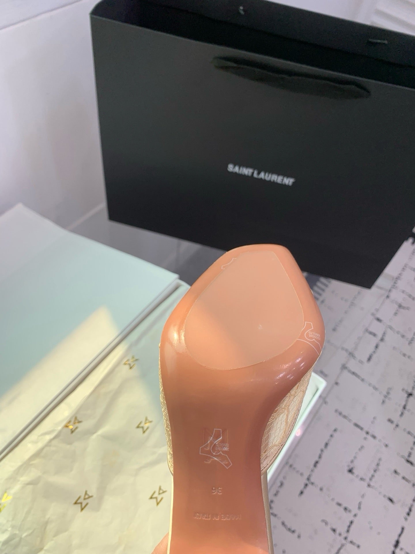 AMINA M HEELS