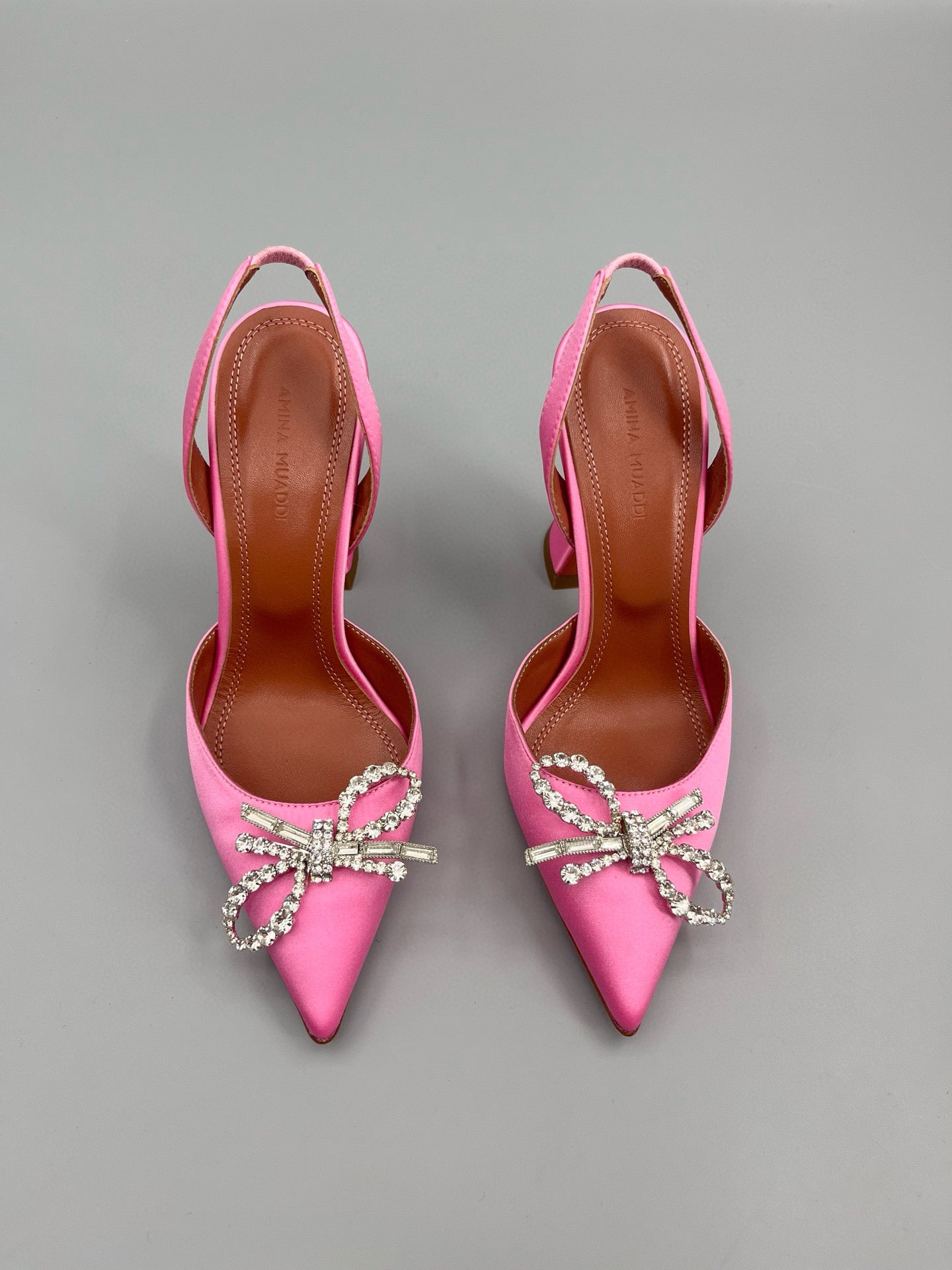 AMINA M HEELS