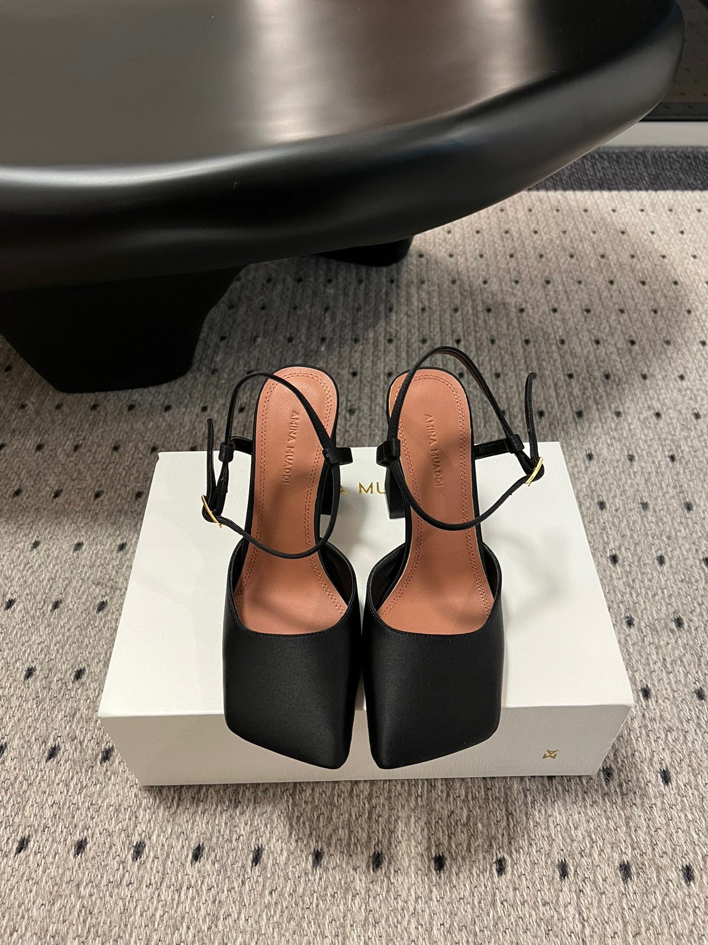 AMINA M HEELS