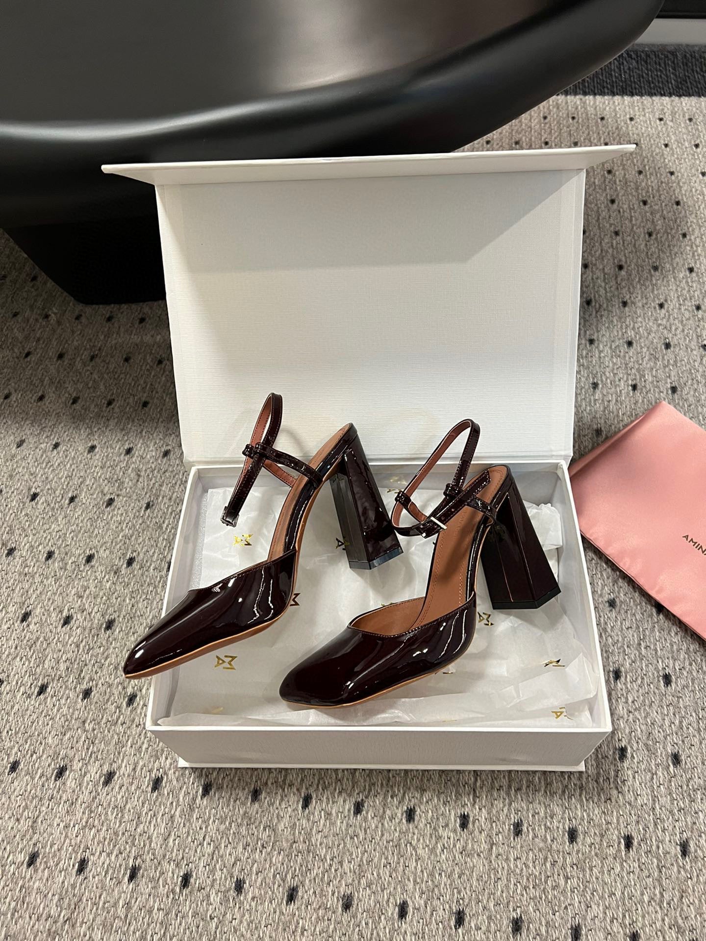 AMINA M HEELS