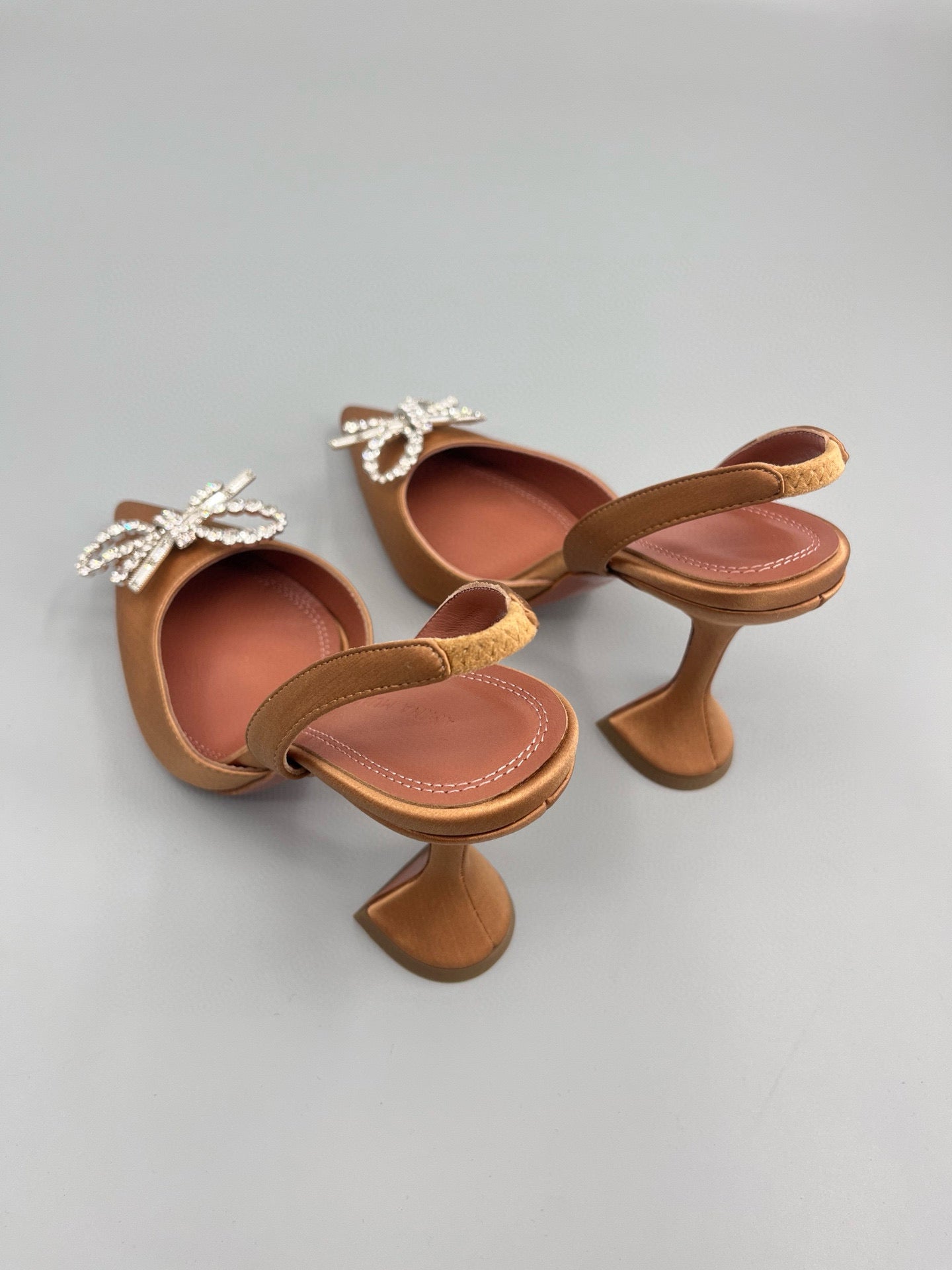 AMINA M HEELS