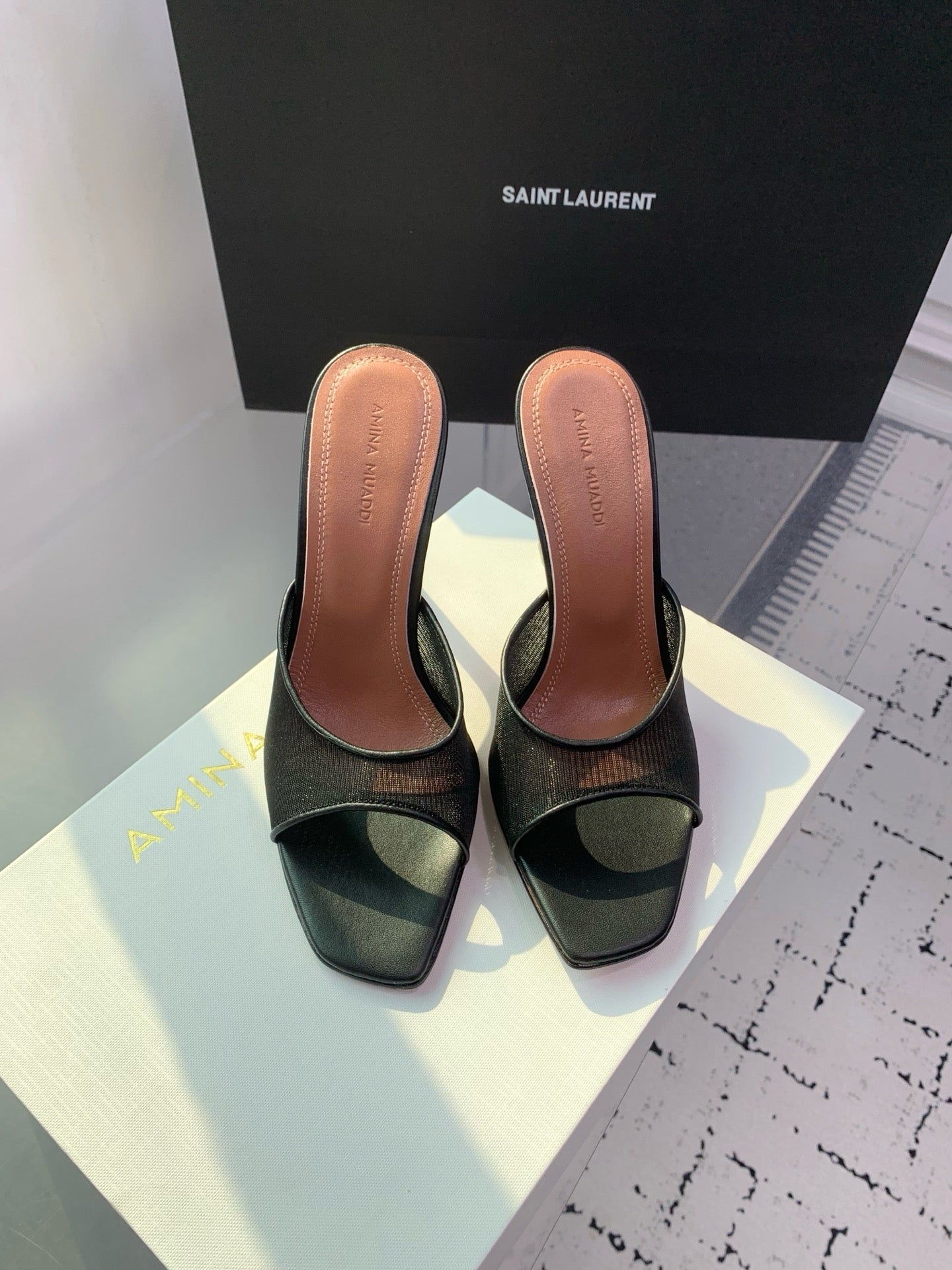 AMINA M HEELS