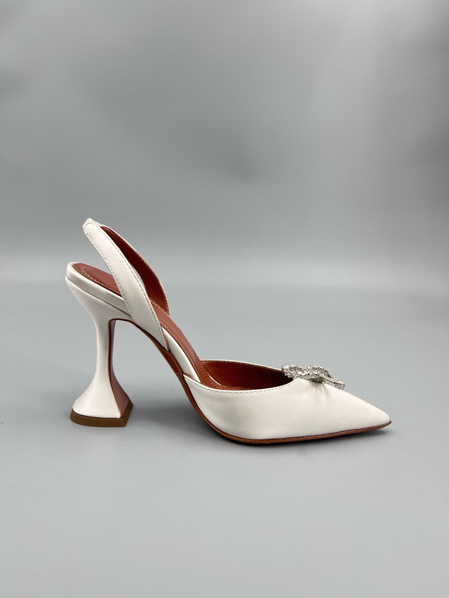 AMINA M HEELS