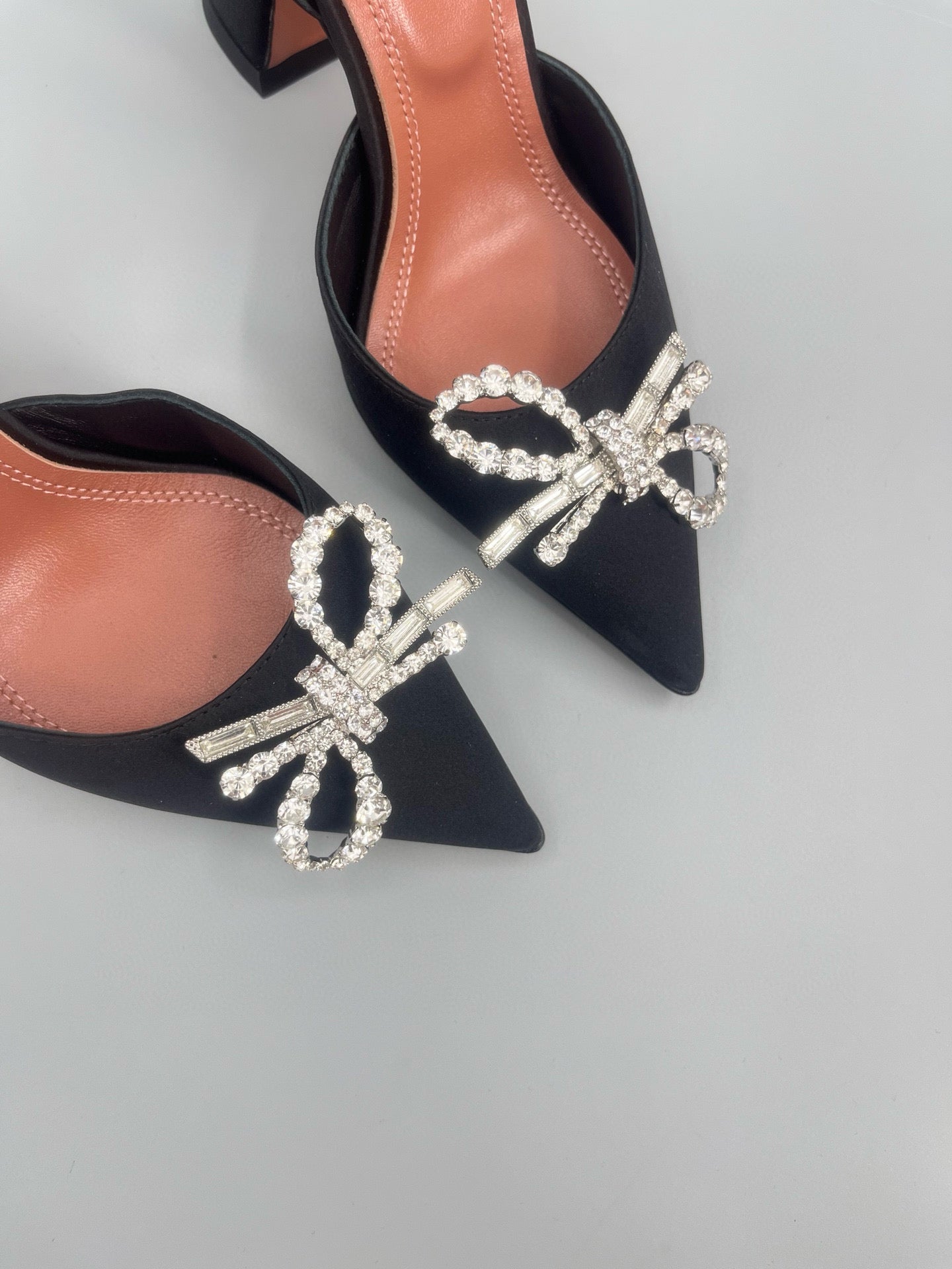 AMINA M HEELS