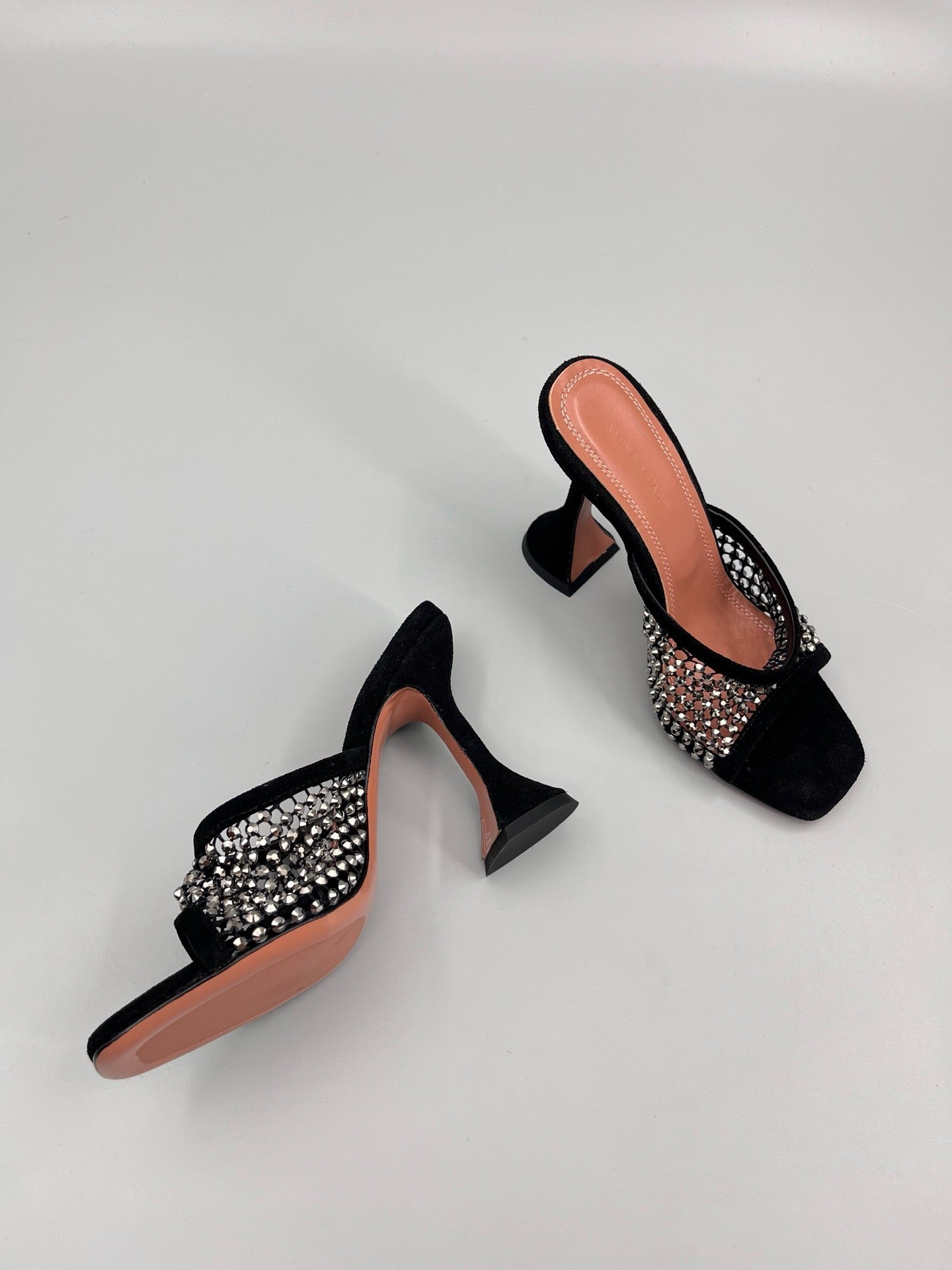 AMINA M HEELS