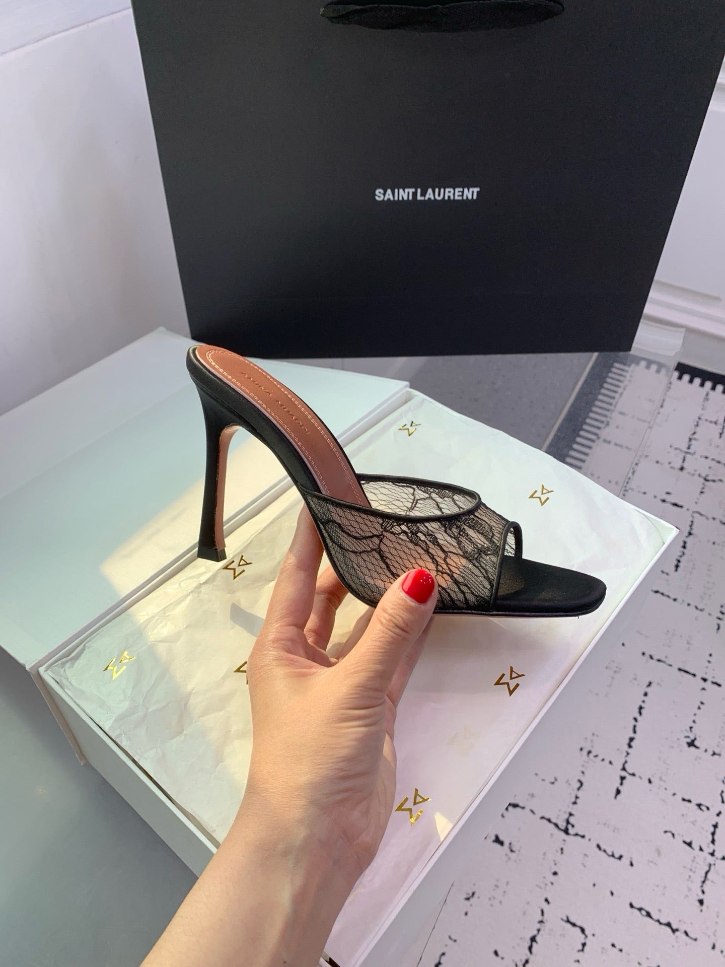 AMINA M HEELS