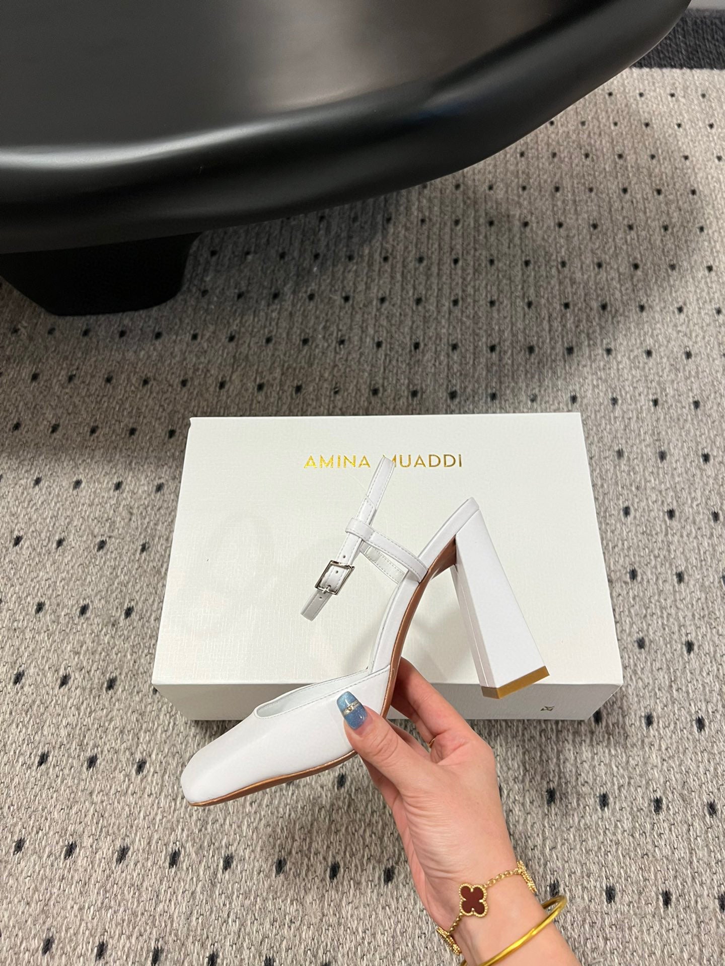 AMINA M HEELS