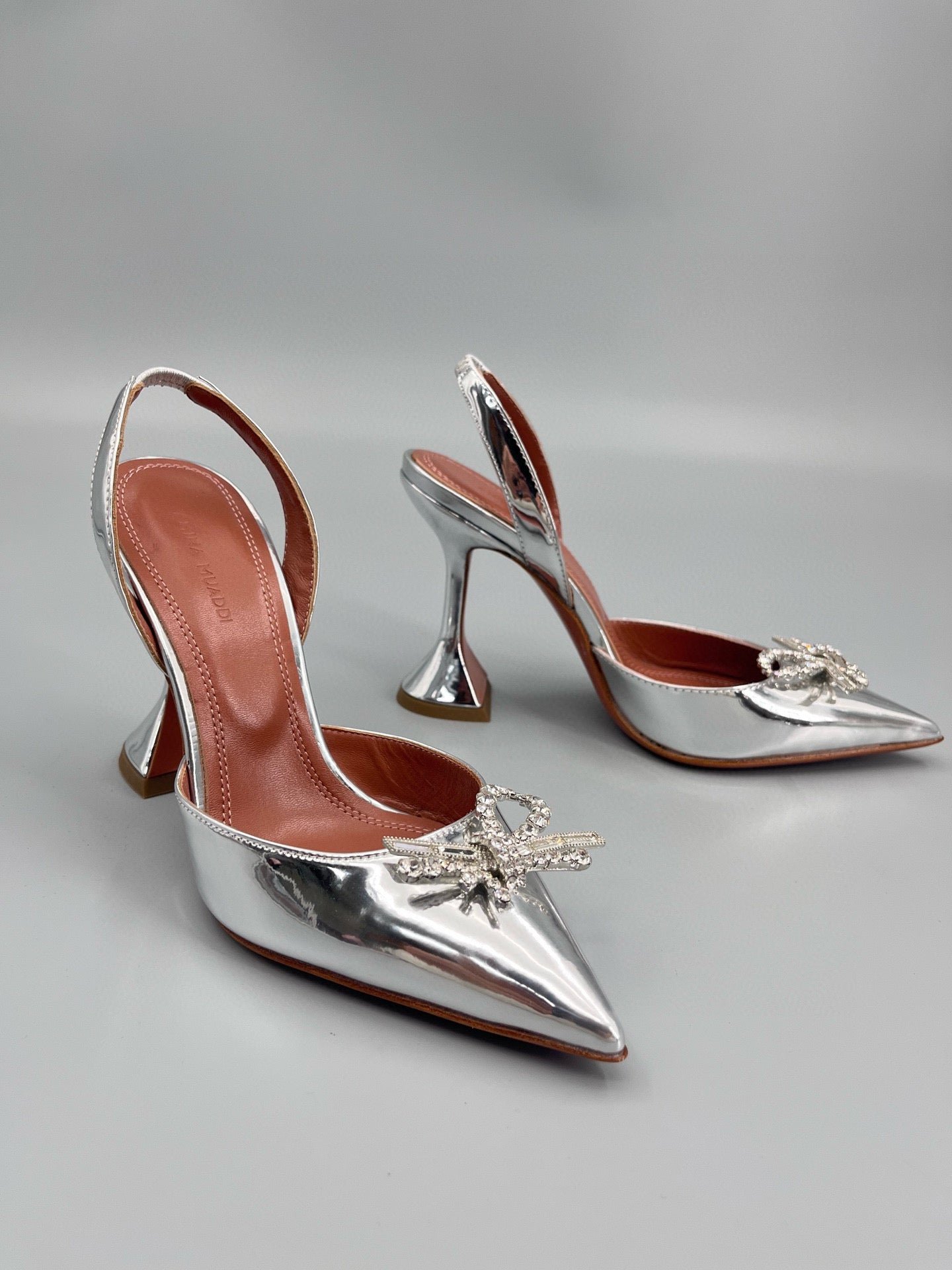 AMINA M HEELS