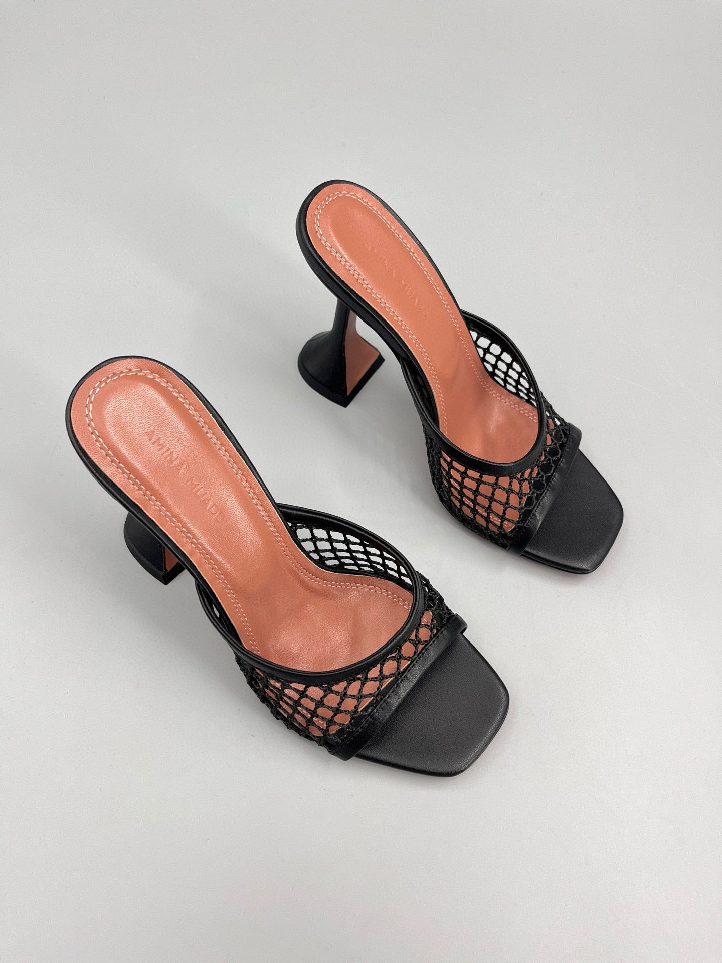 AMINA M HEELS