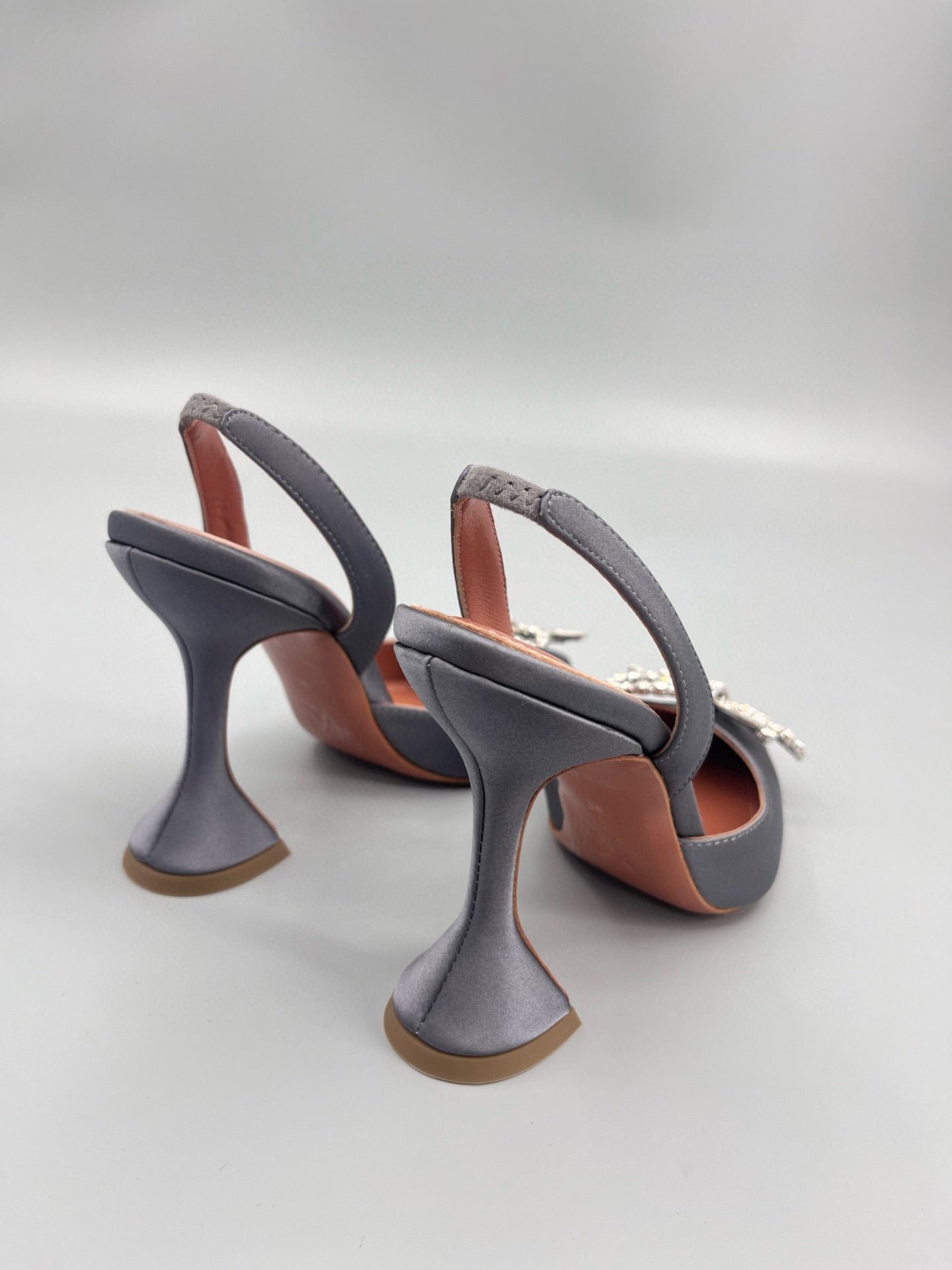 AMINA M HEELS