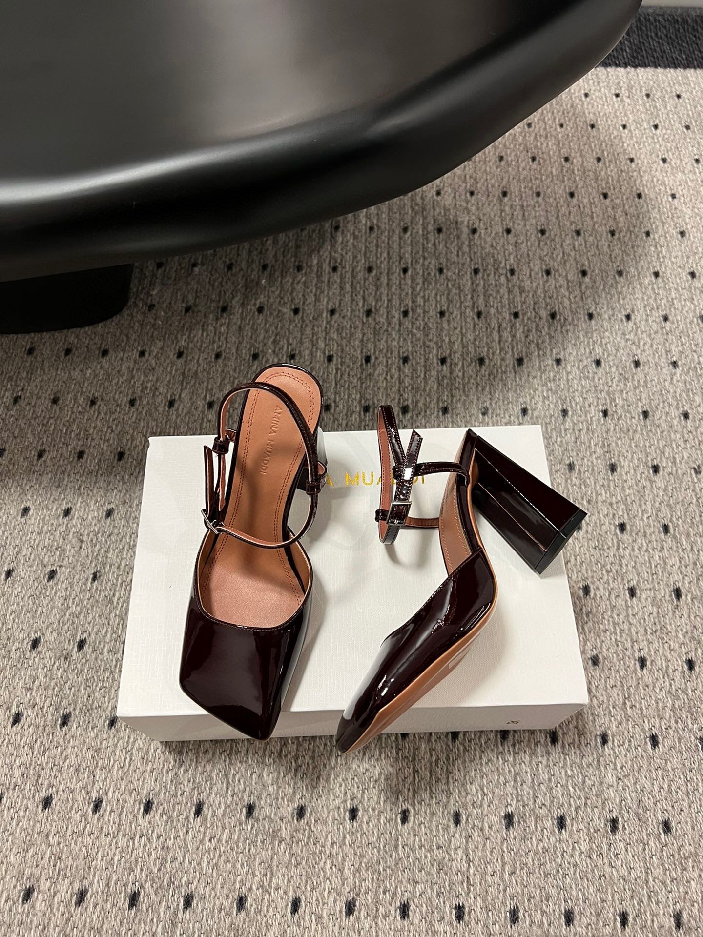 AMINA M HEELS