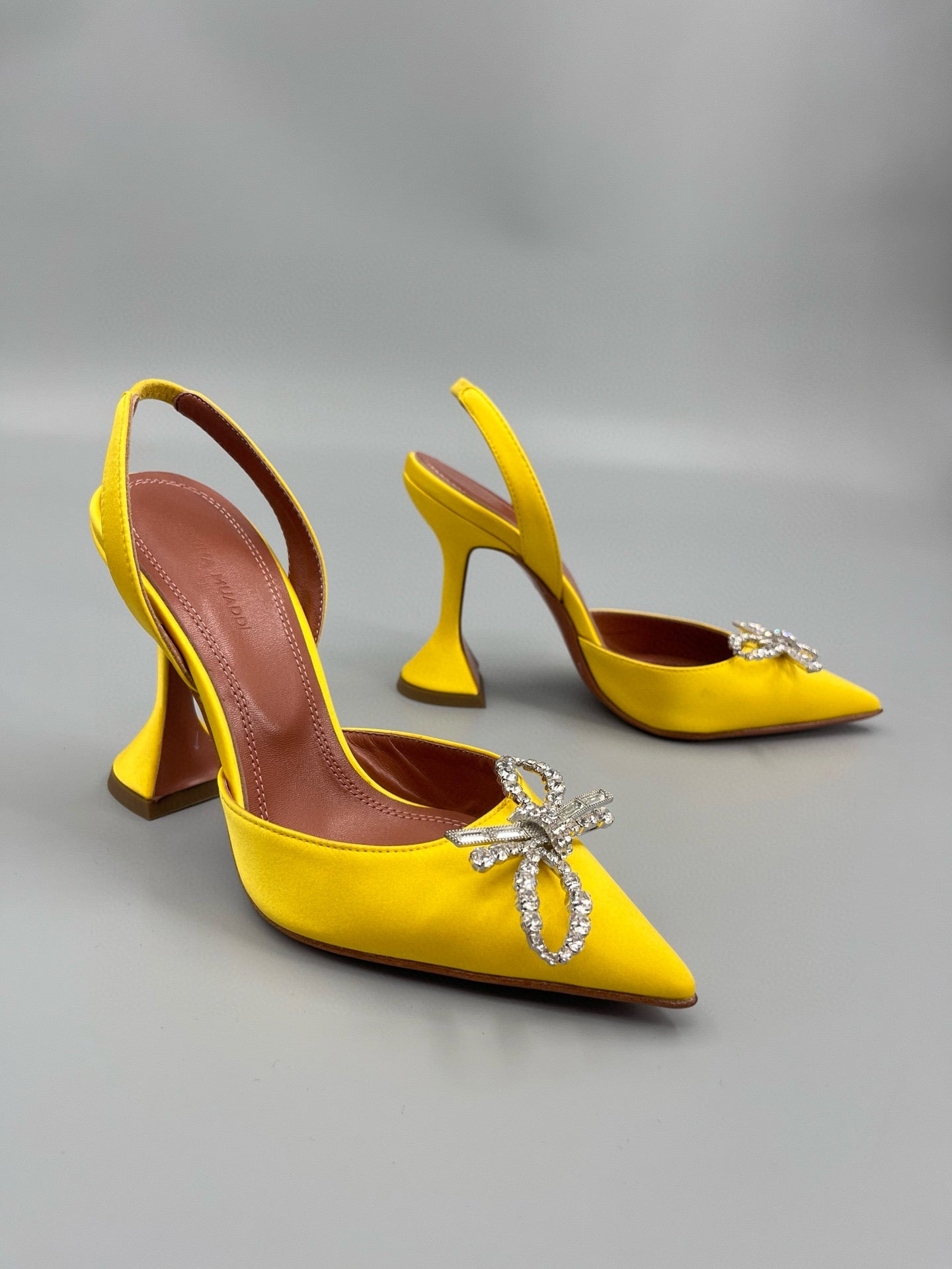 AMINA M HEELS
