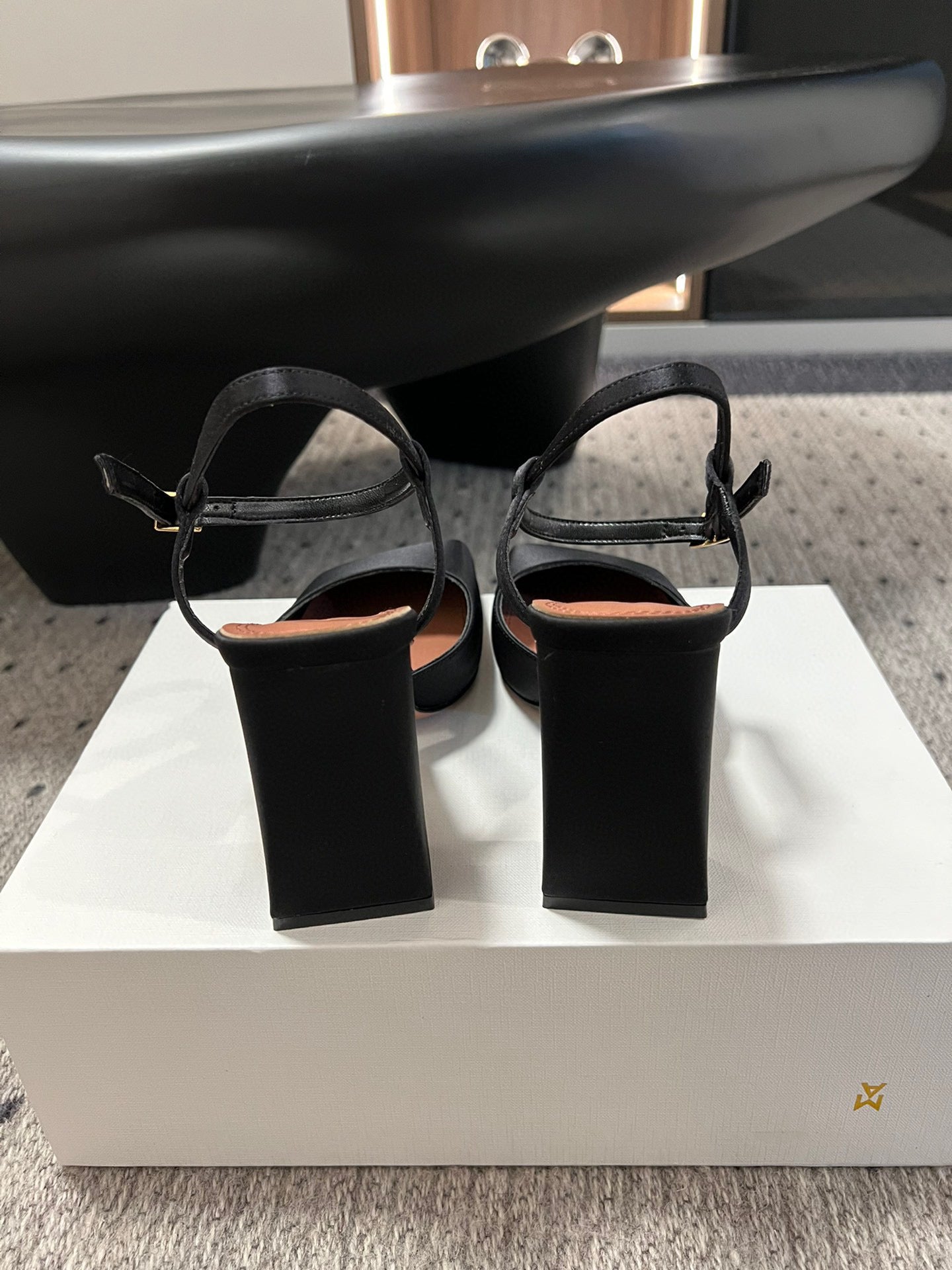 AMINA M HEELS